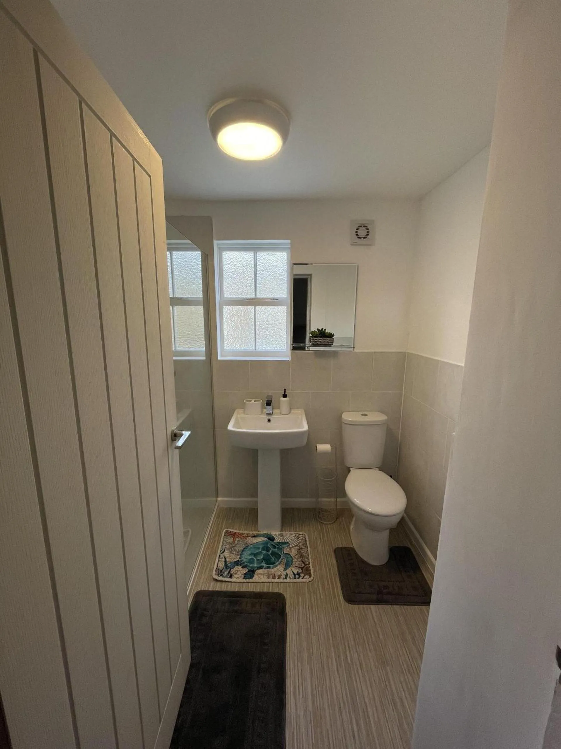 Bathroom in Coastal Comfort, Seaside Flat