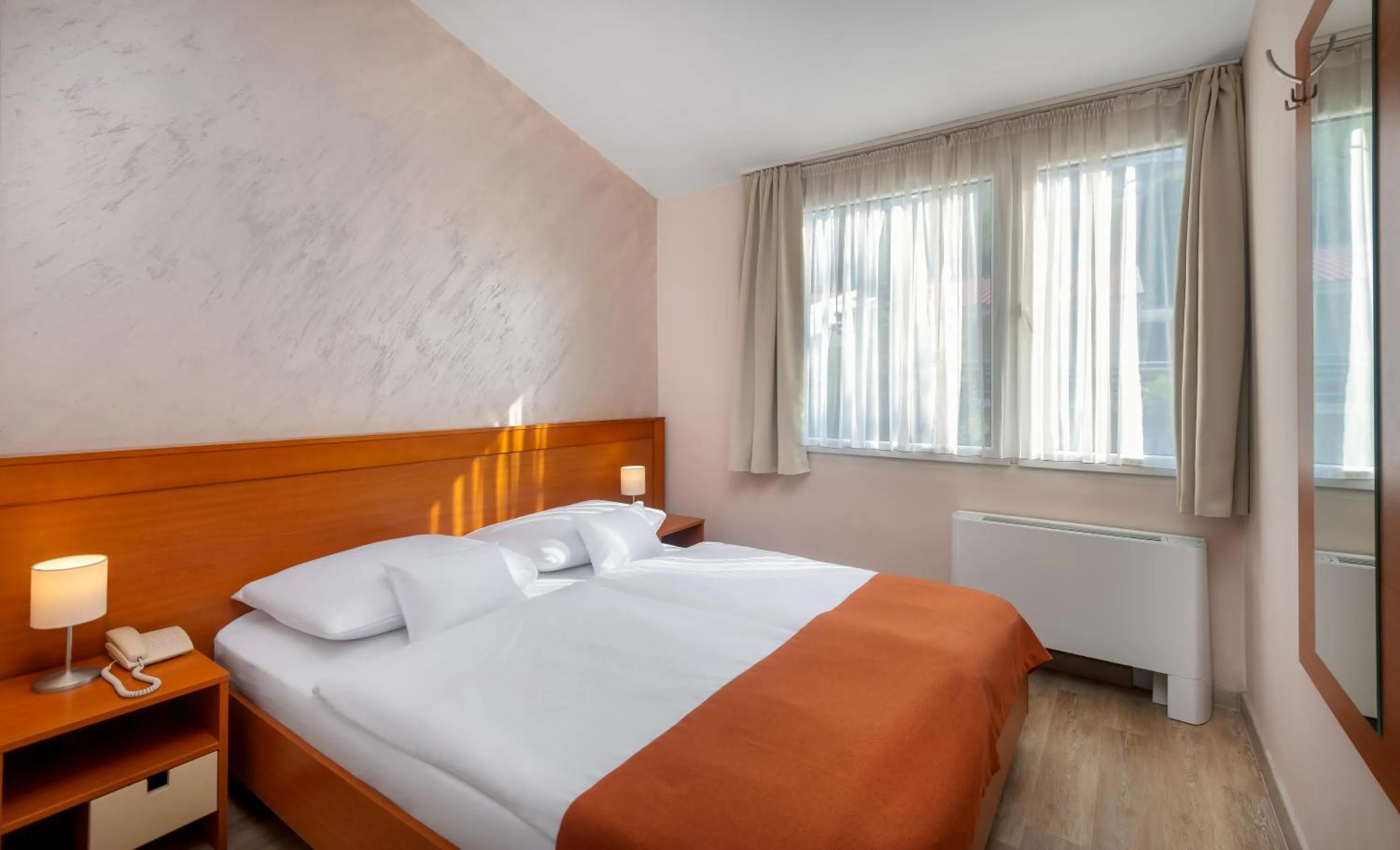 Bedroom, Bed in Hunguest Hotel Sun Resort