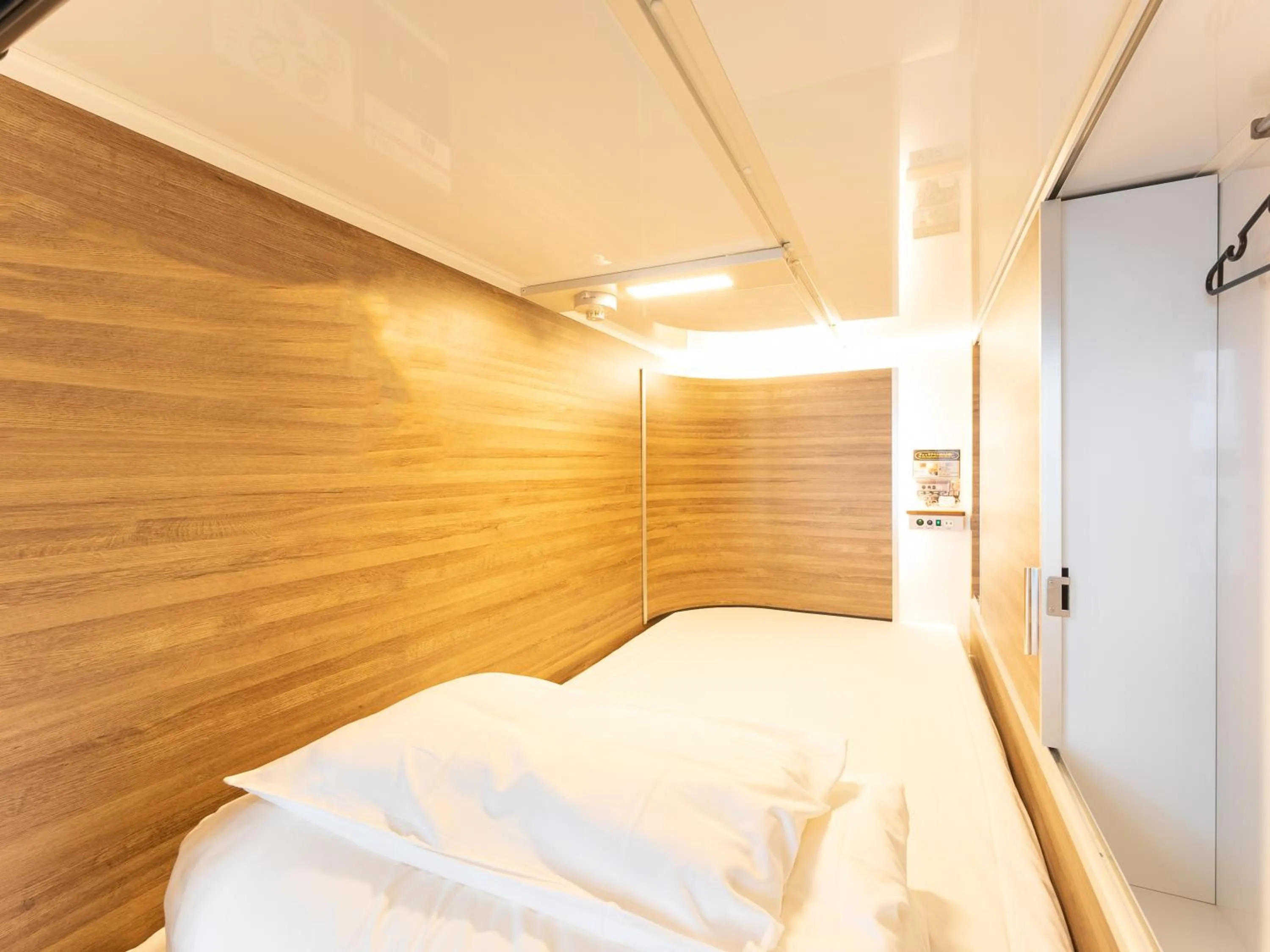 Photo of the whole room, Bed in Tabist MAYUDAMA CABIN