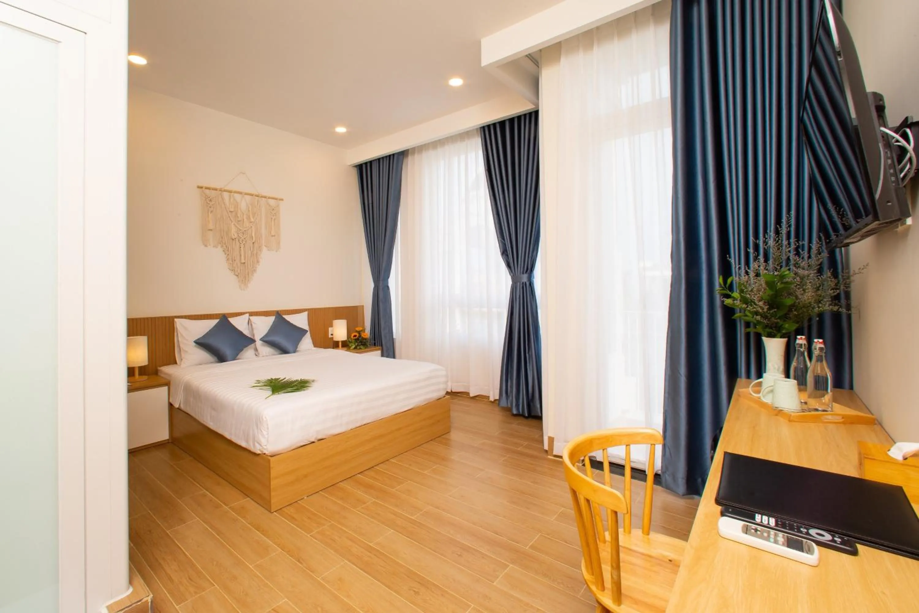 Photo of the whole room, Bed in Vy's House Phanthiet Hotel