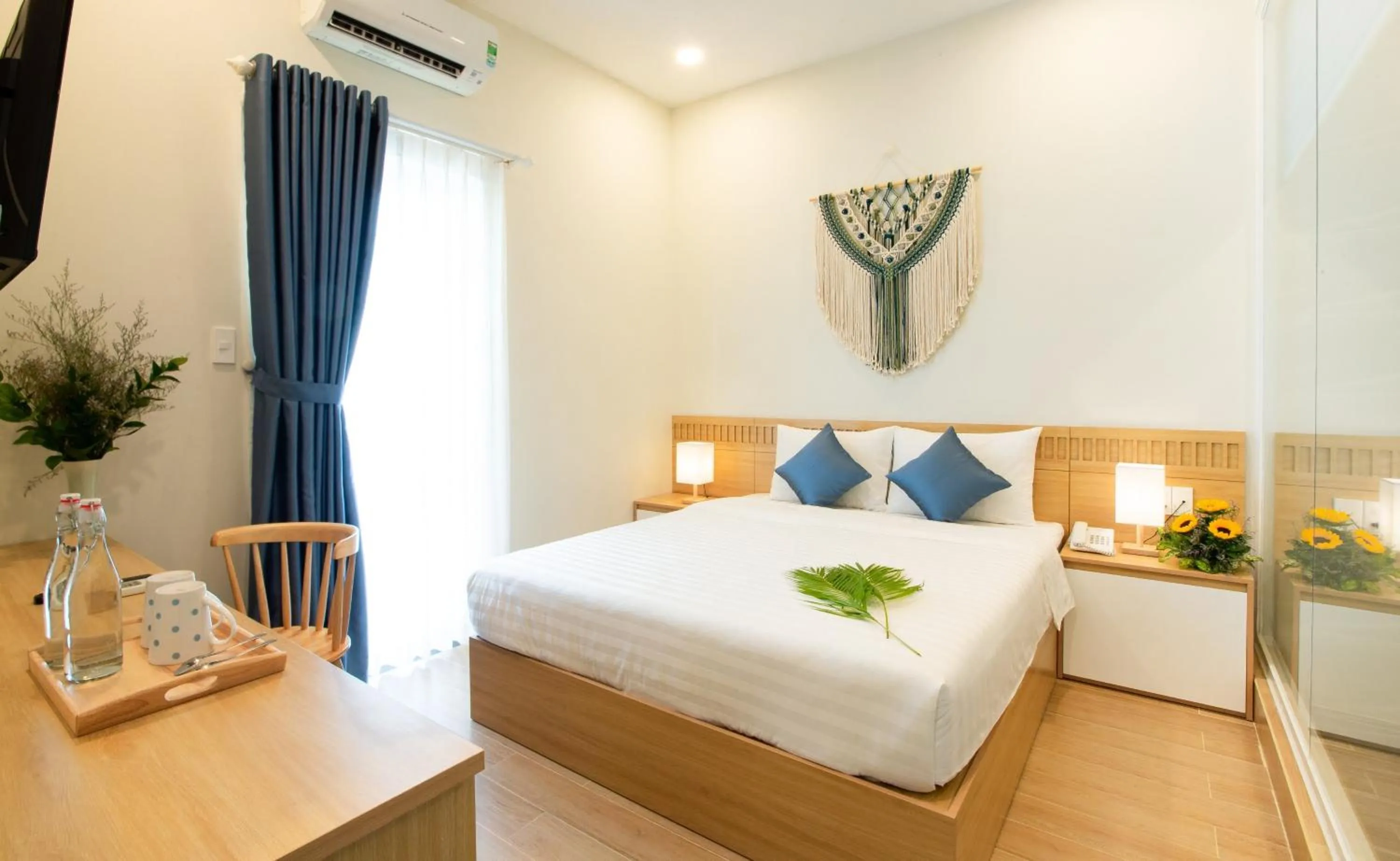 Bed in Vy's House Phanthiet Hotel