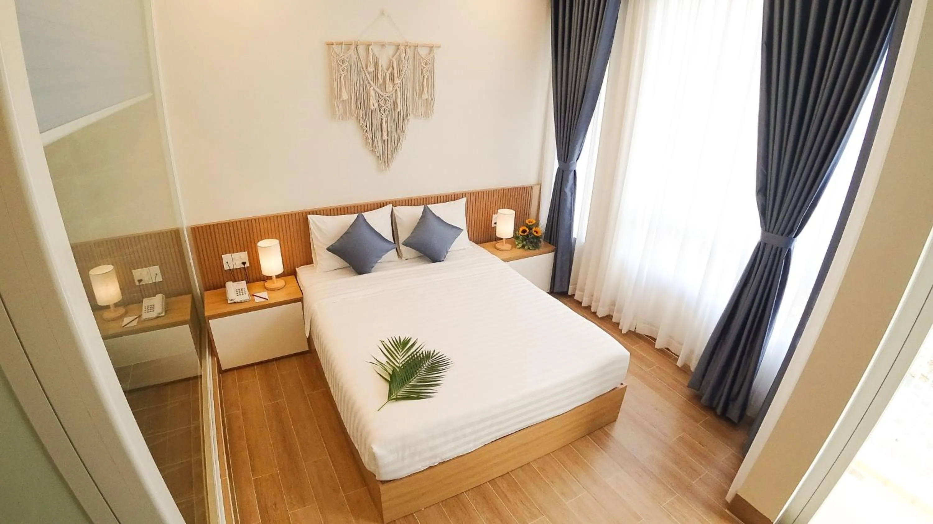 Photo of the whole room, Bed in Vy's House Phanthiet Hotel