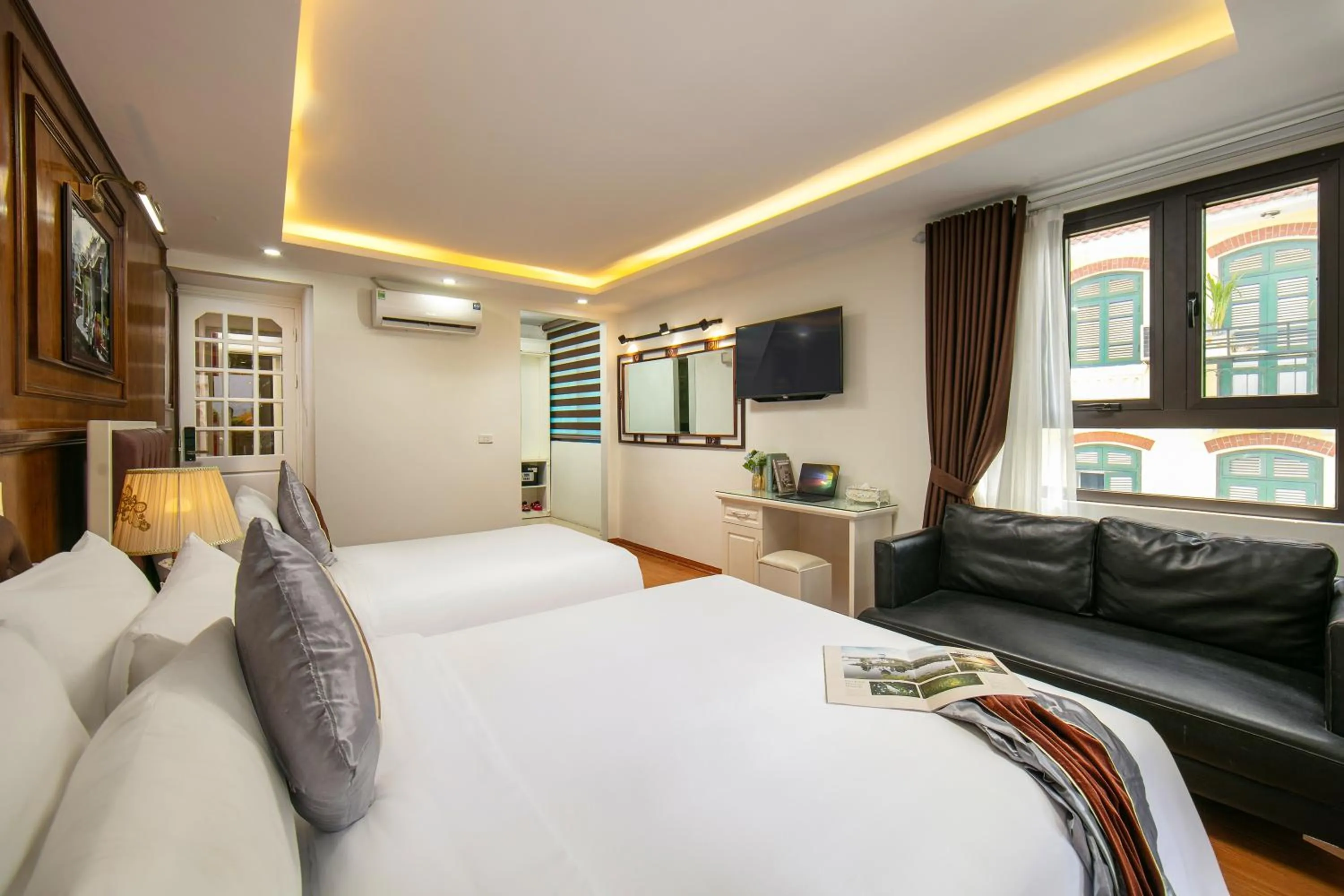 Bed in Tunger Grand Hotel