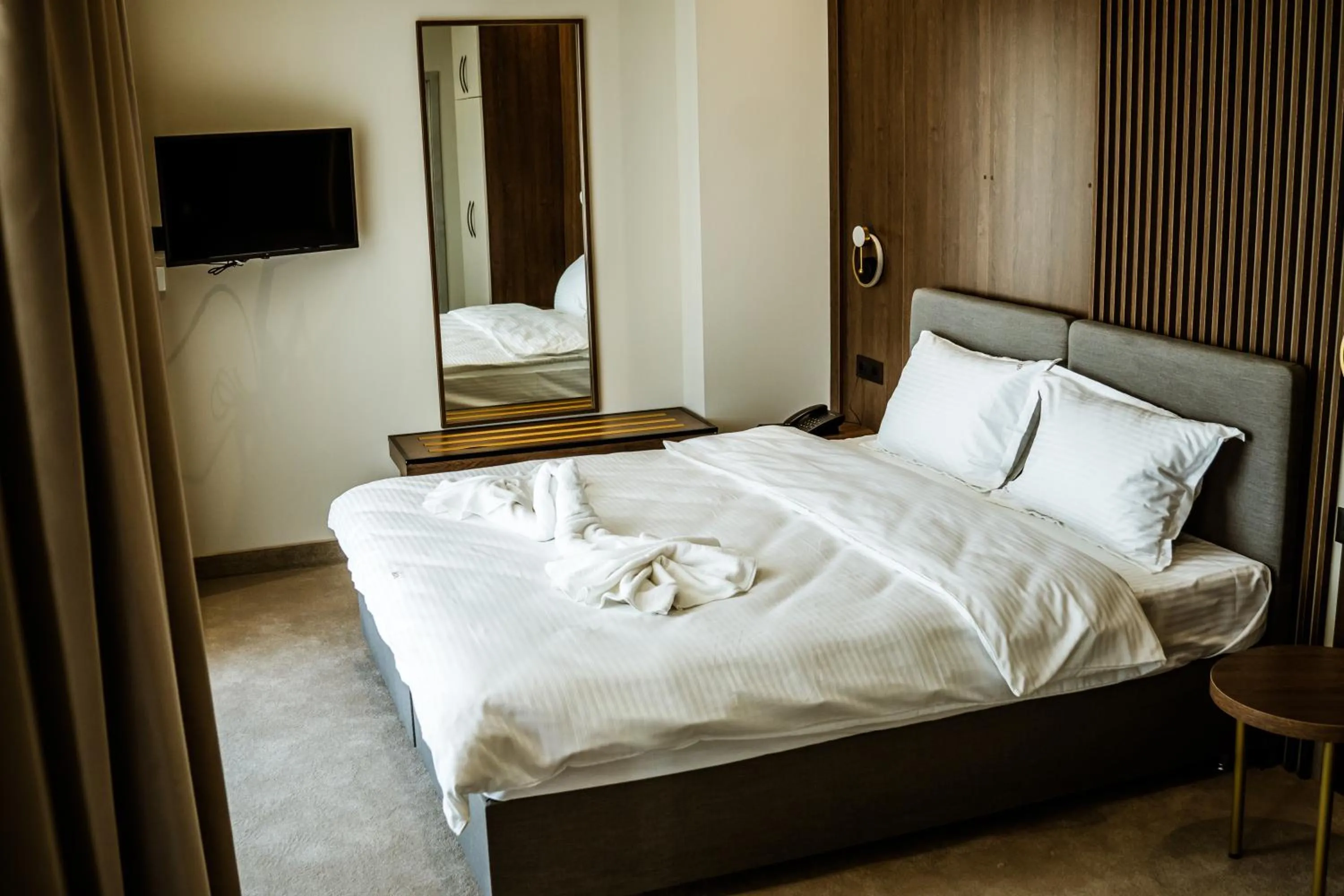 Bed in Sonio Boutique Hotel