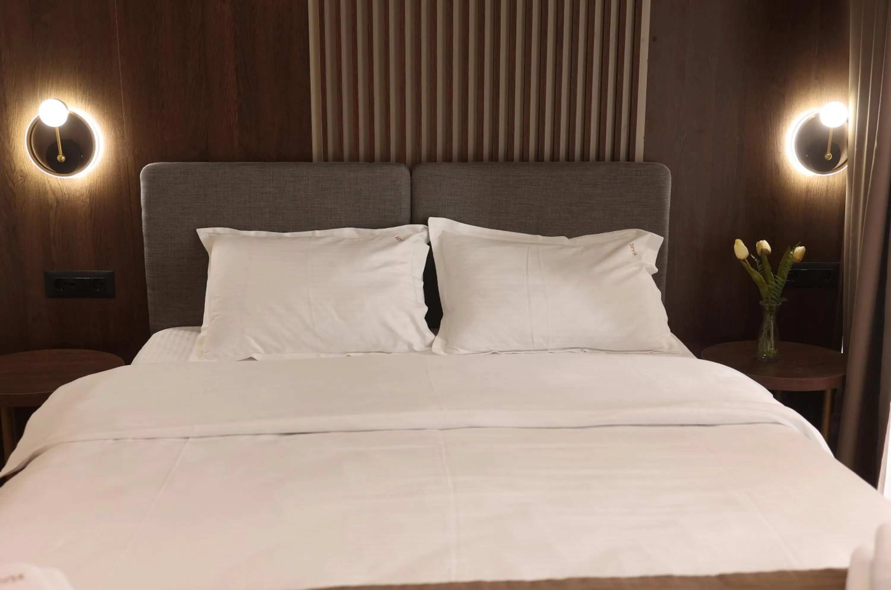 Bed in Sonio Boutique Hotel