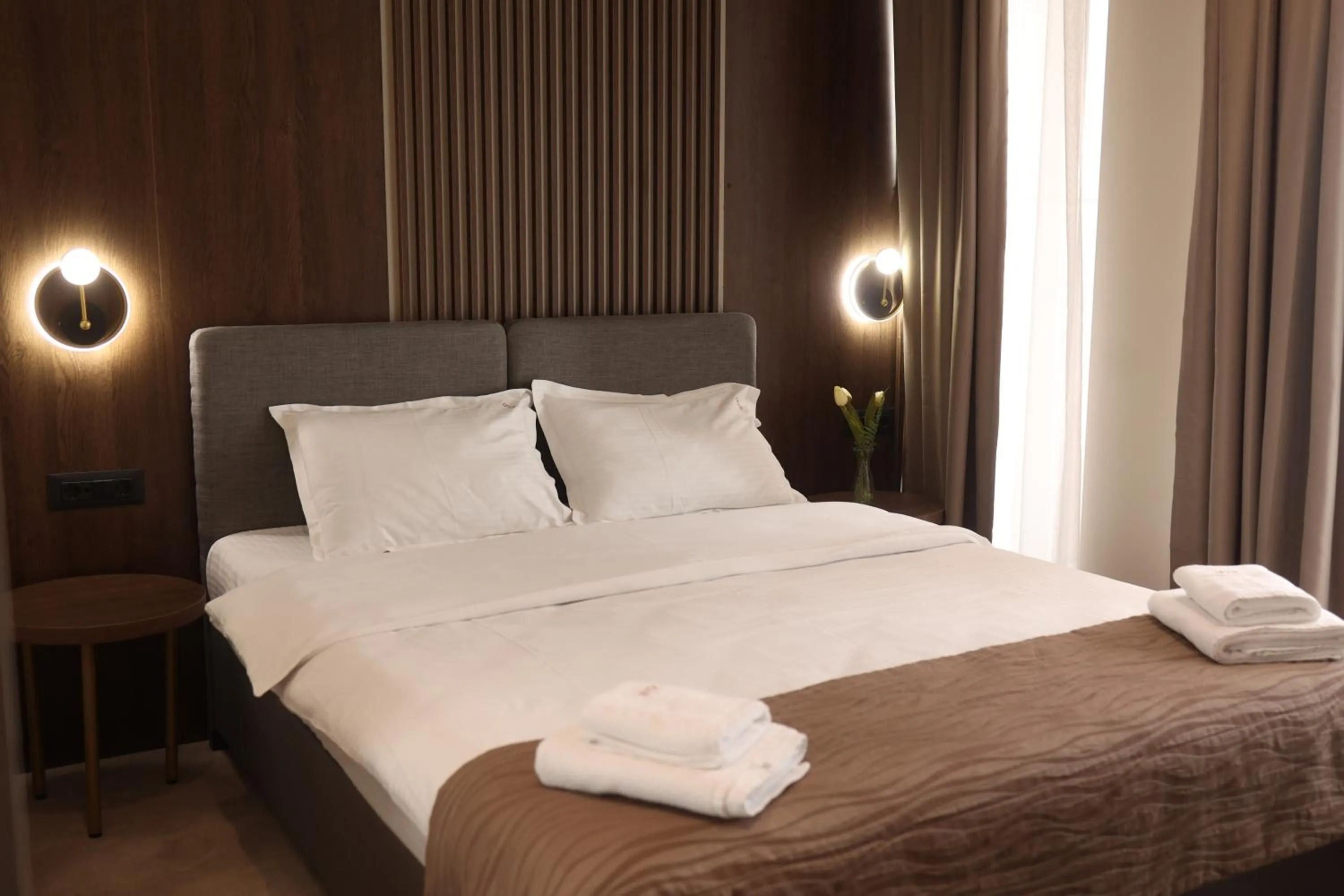 Bed in Sonio Boutique Hotel