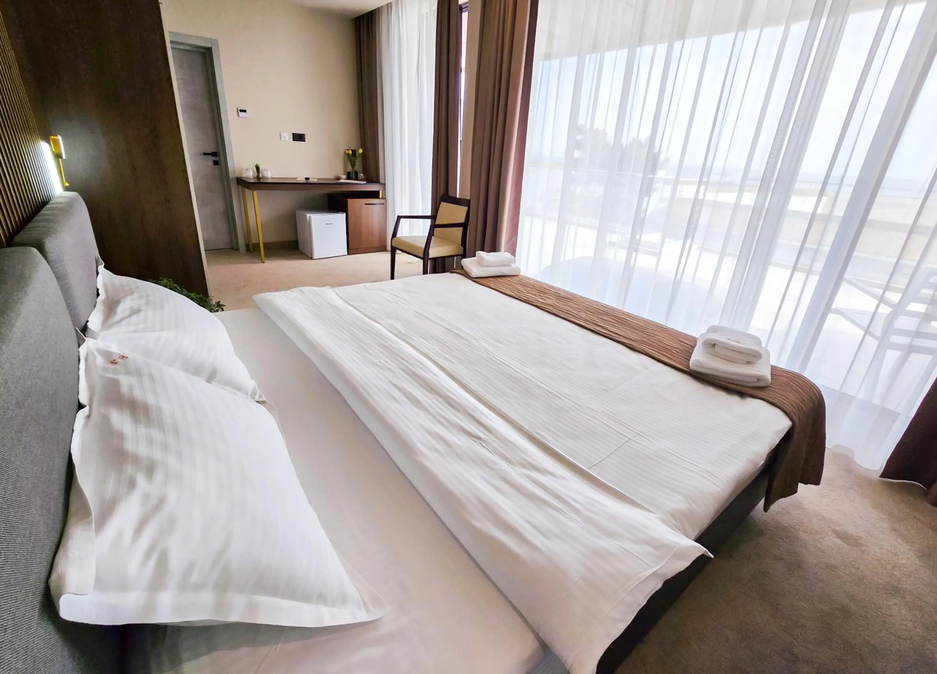 Bed in Sonio Boutique Hotel