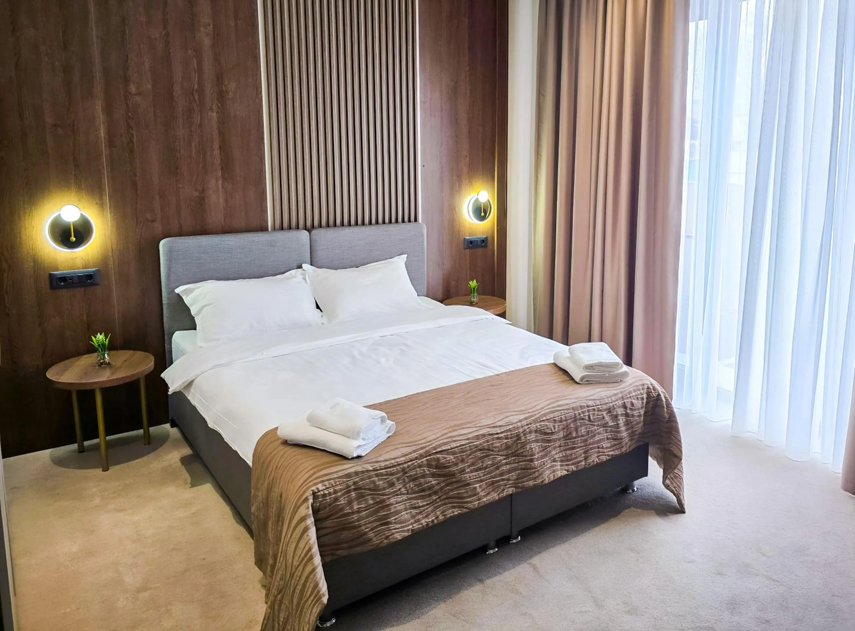 Bed in Sonio Boutique Hotel