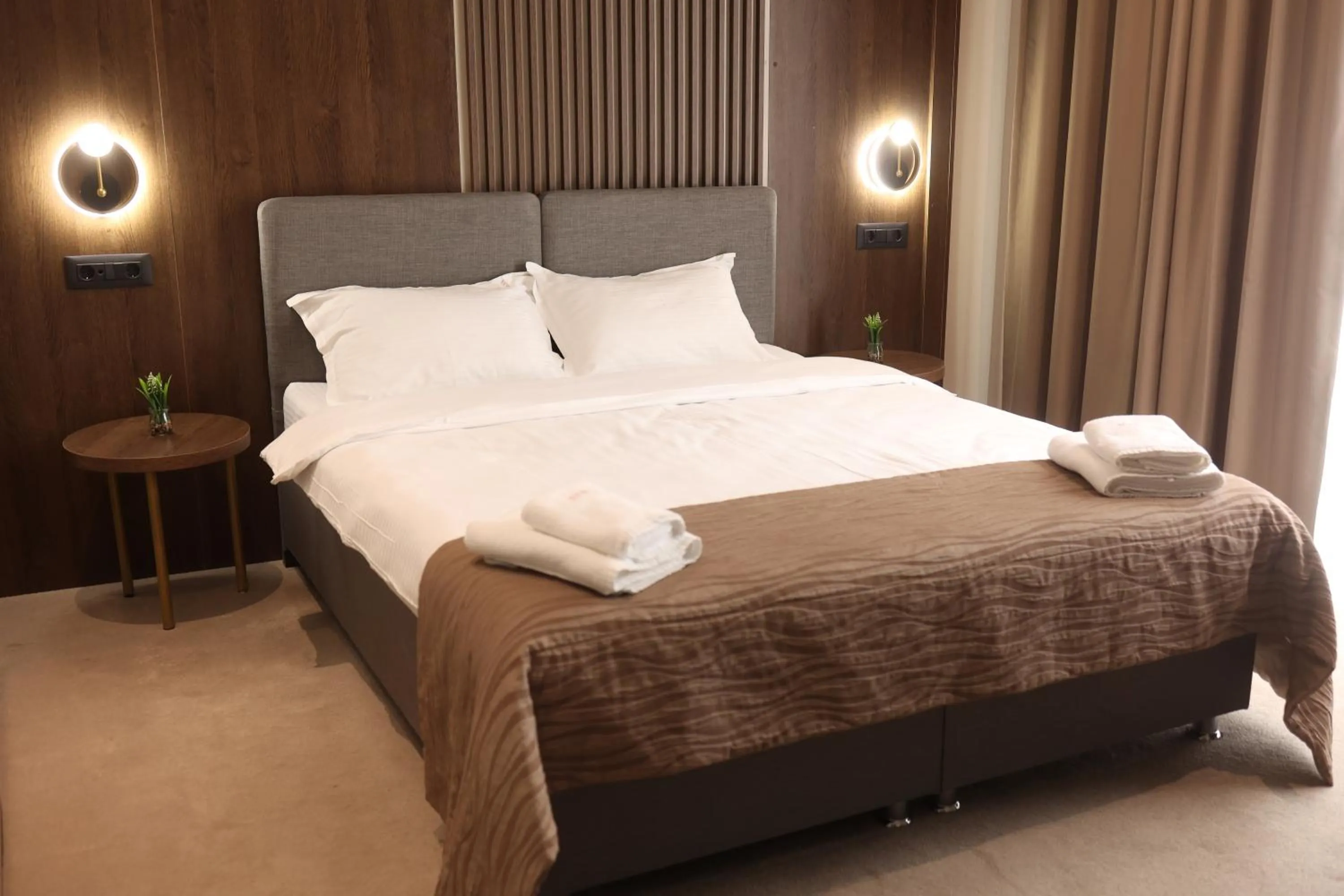 Bed in Sonio Boutique Hotel