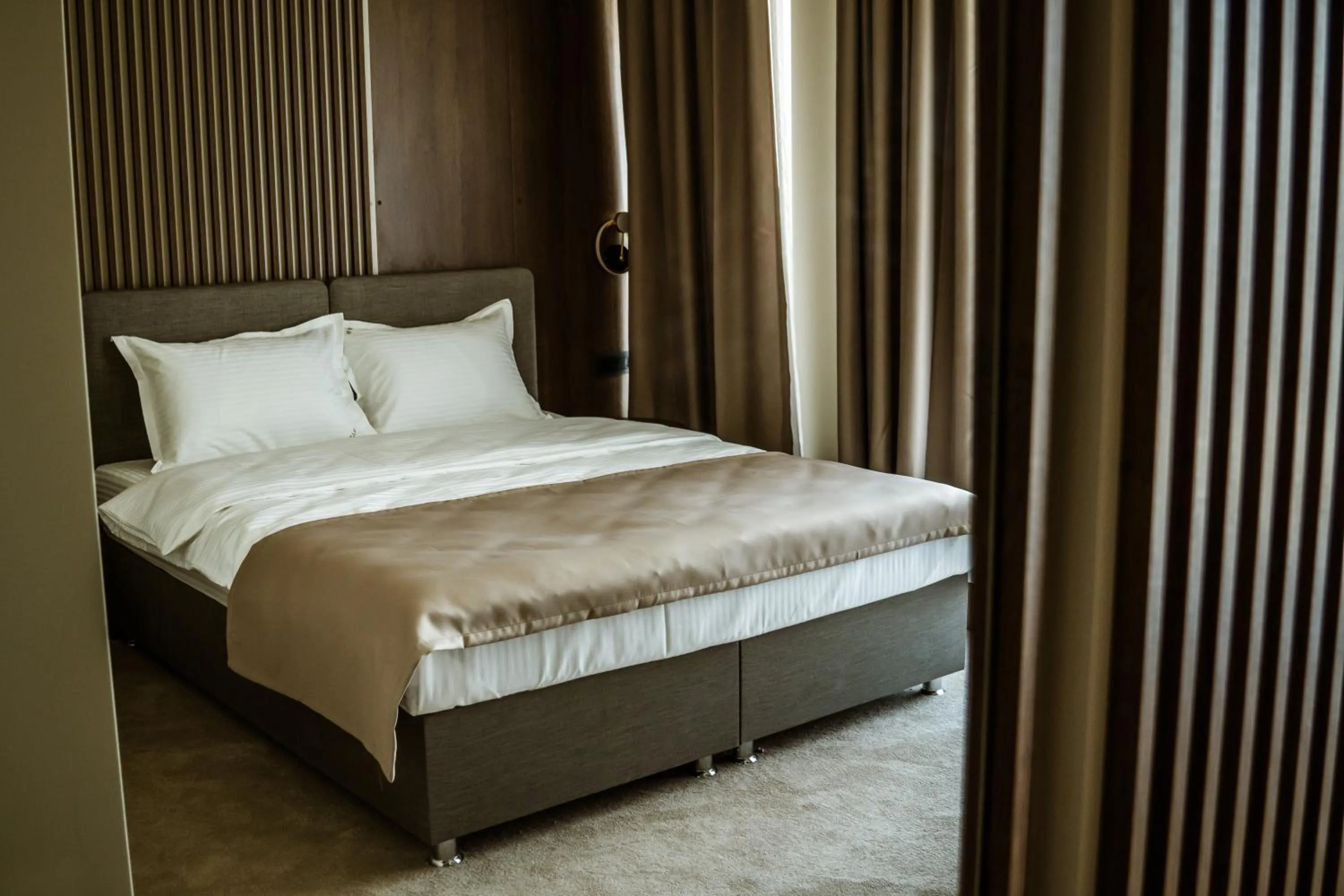 Bed in Sonio Boutique Hotel