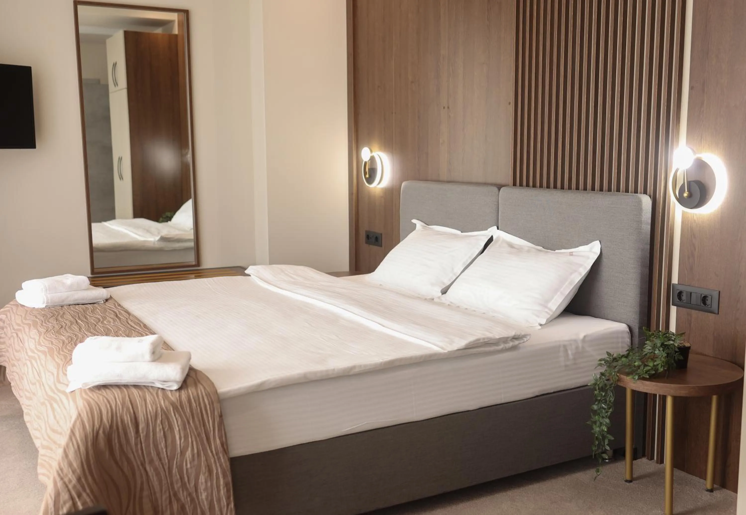 Bed in Sonio Boutique Hotel