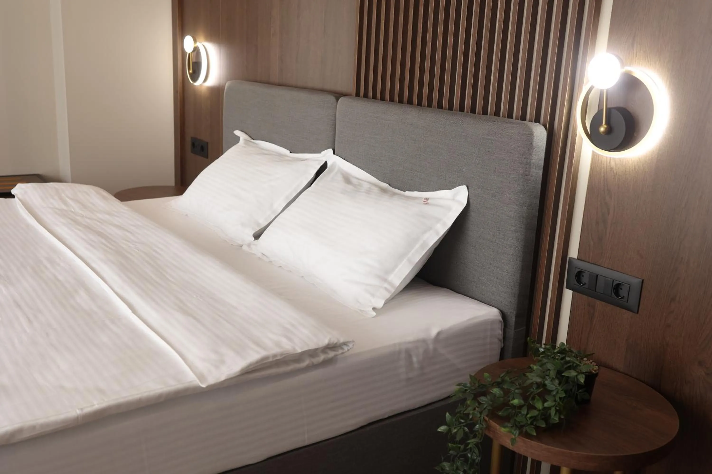 Bed in Sonio Boutique Hotel