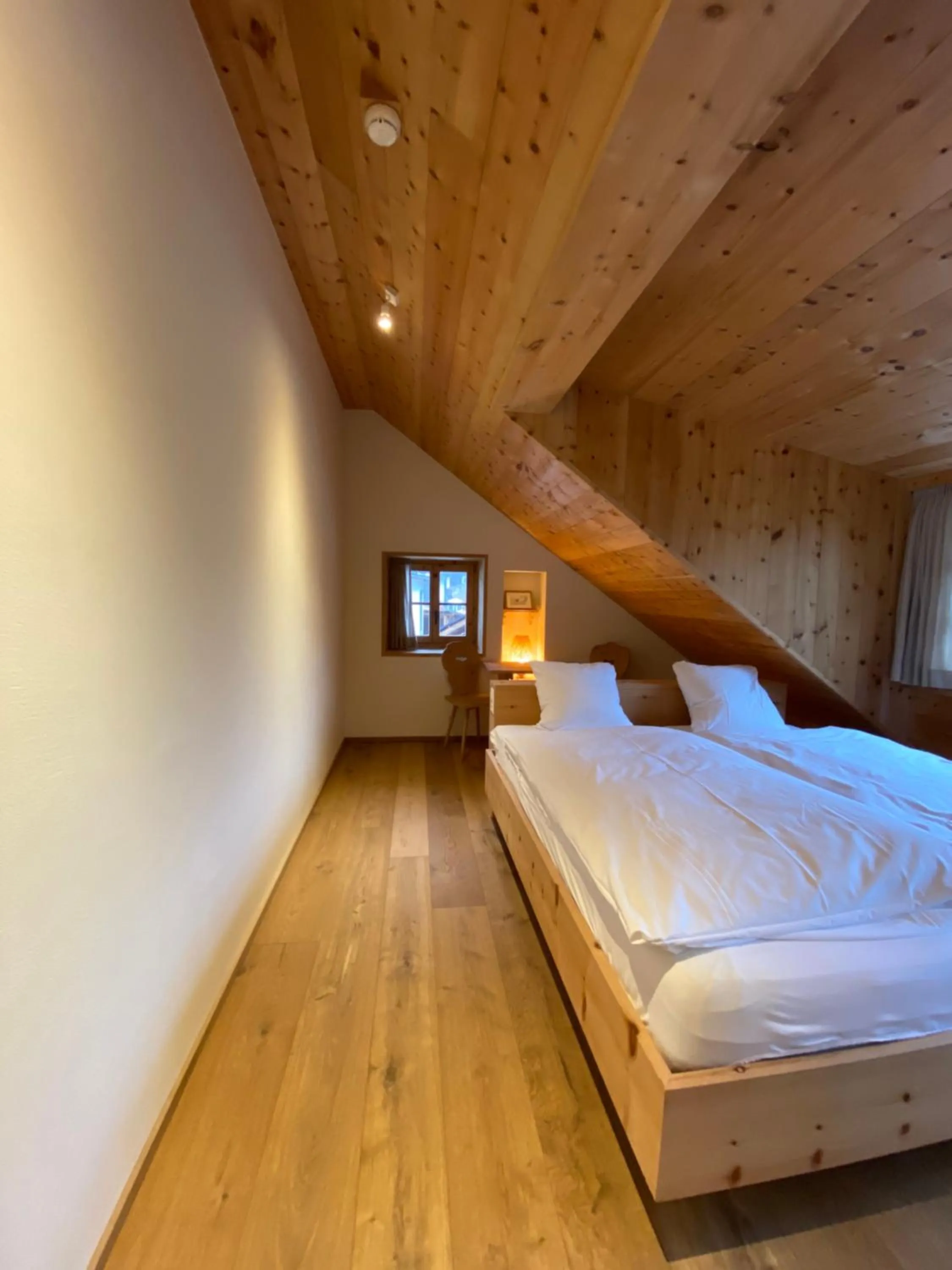 Photo of the whole room, Bed in Alpengasthof Crusch Alba ed Alvetern, S-charl