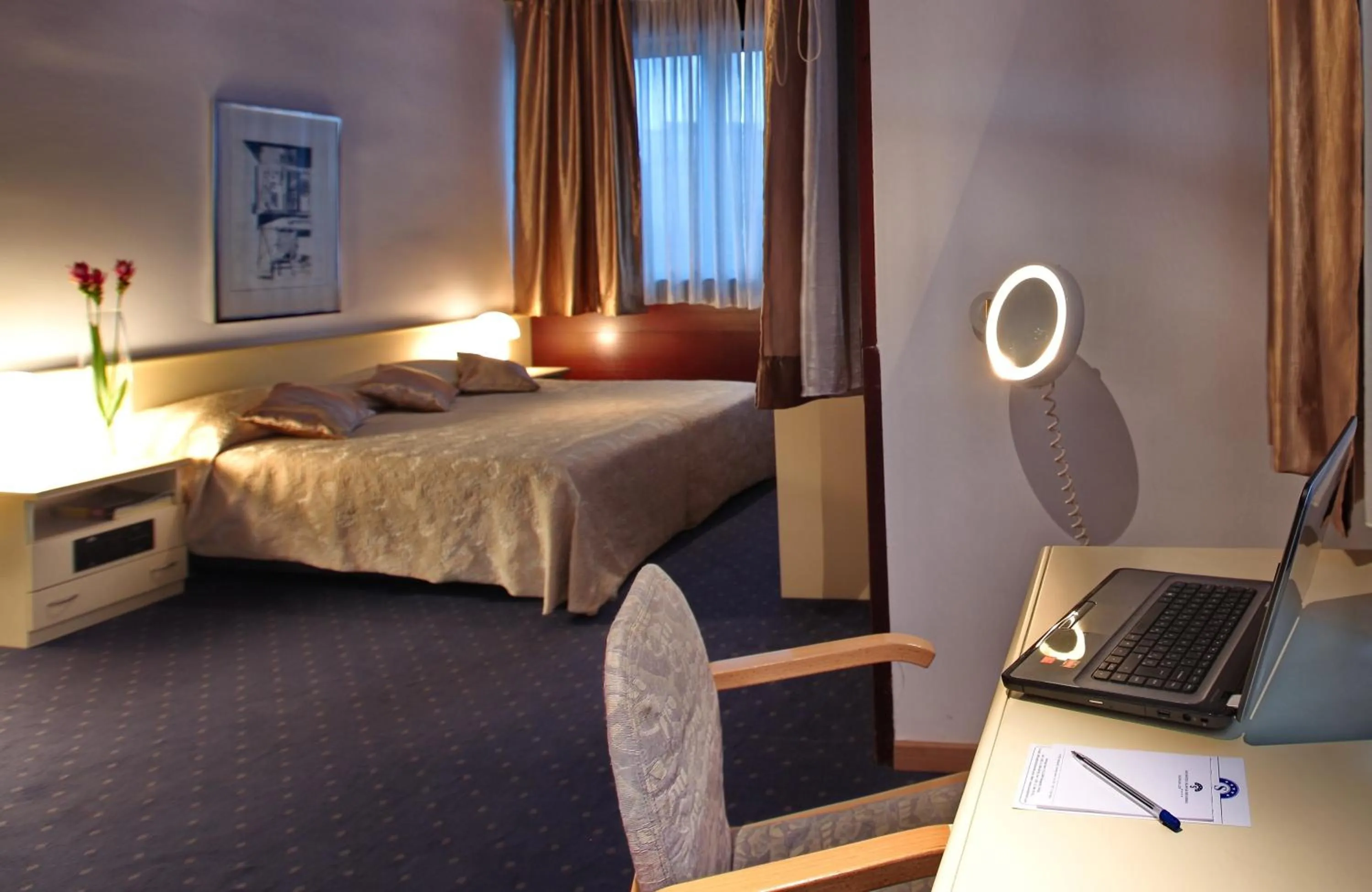 Bed in Hotel Slavija Lux