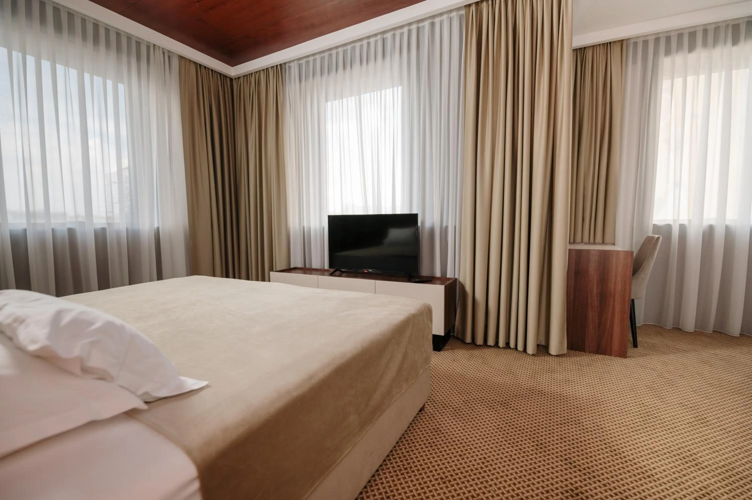 Bed in Hotel Slavija Lux