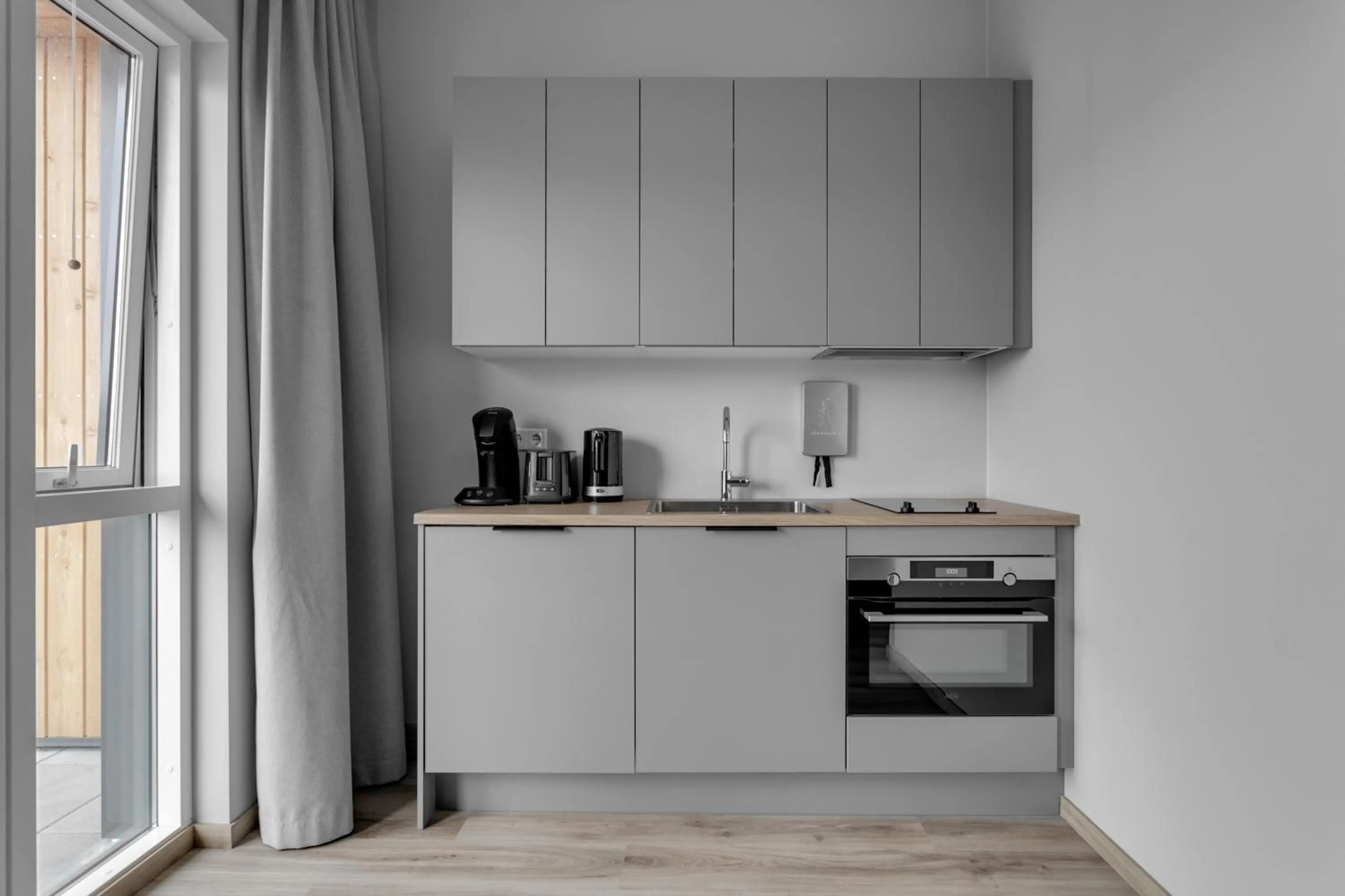 Kitchen or kitchenette in B18 Apartments