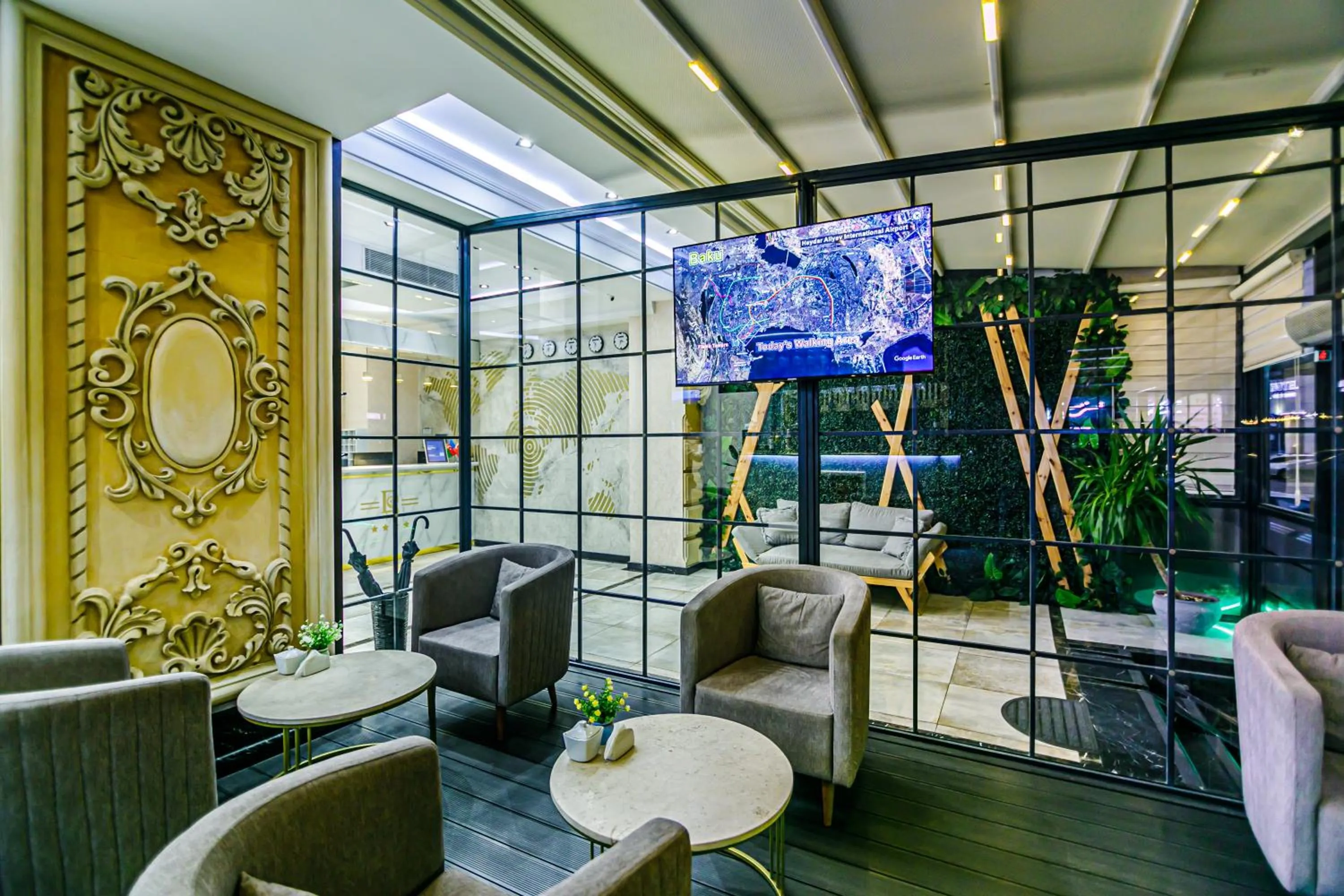 Communal lounge/ TV room in Essam Deluxe Hotel