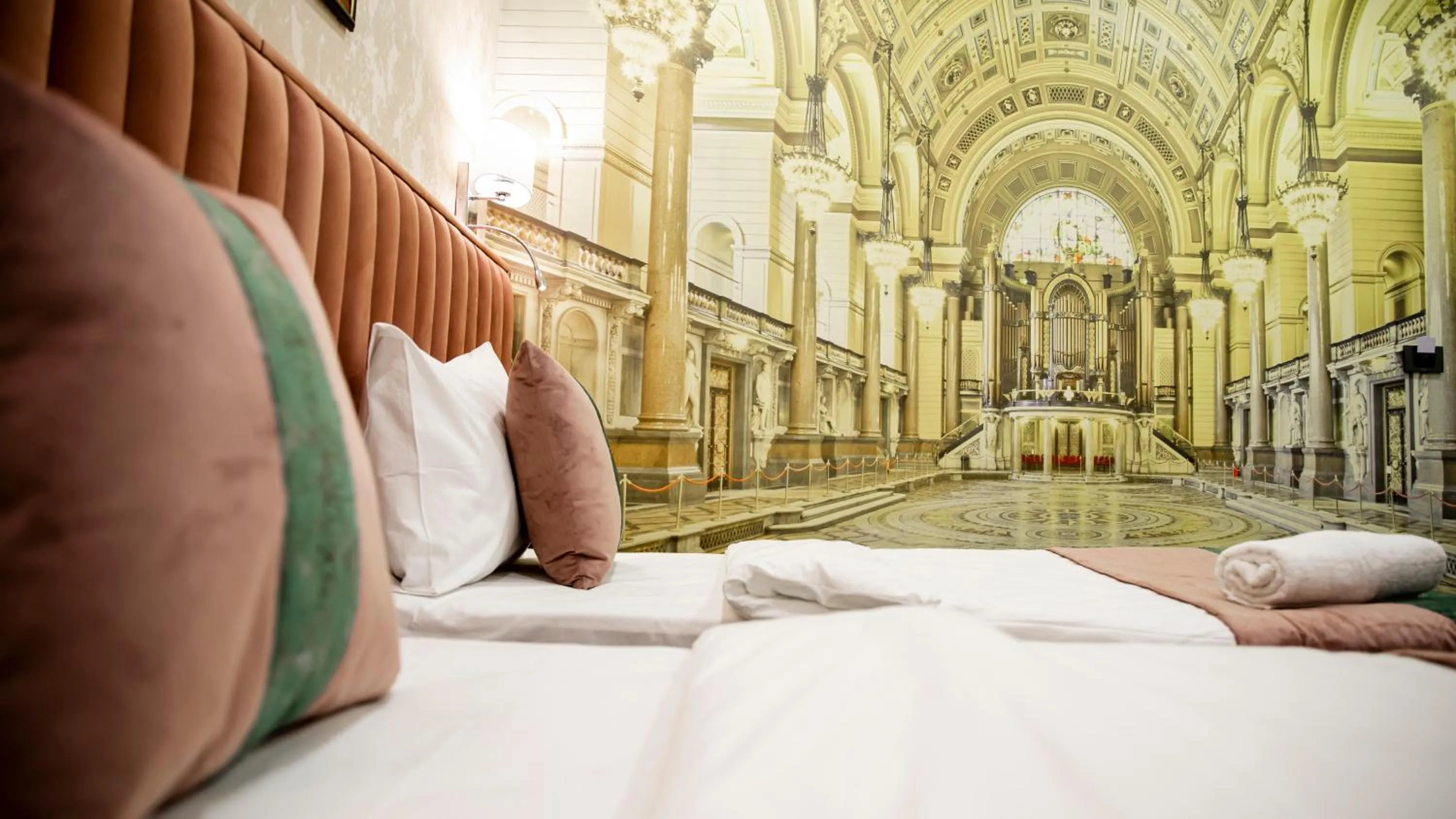 Bed in Essam Deluxe Hotel