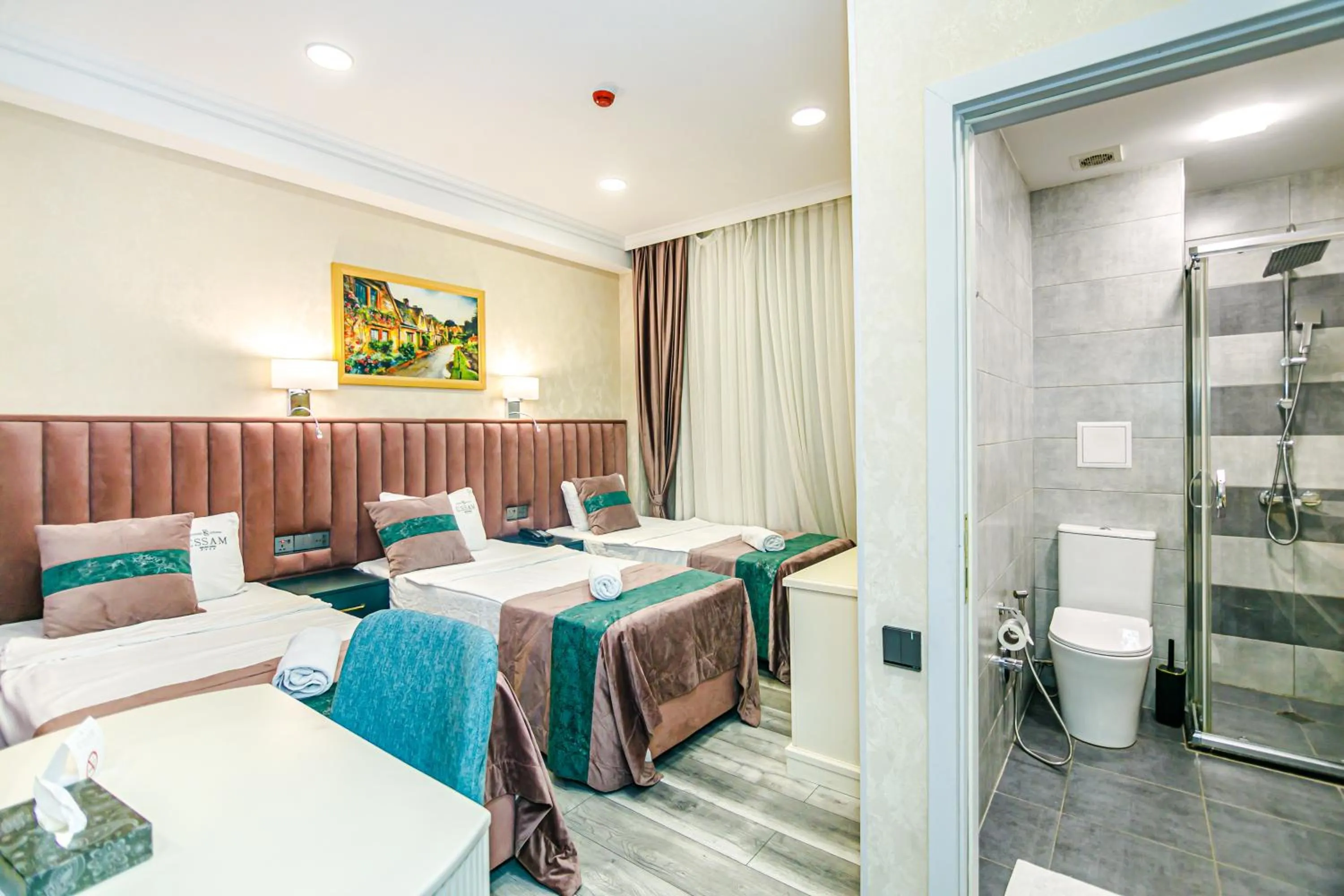 Photo of the whole room, Bed in Essam Deluxe Hotel