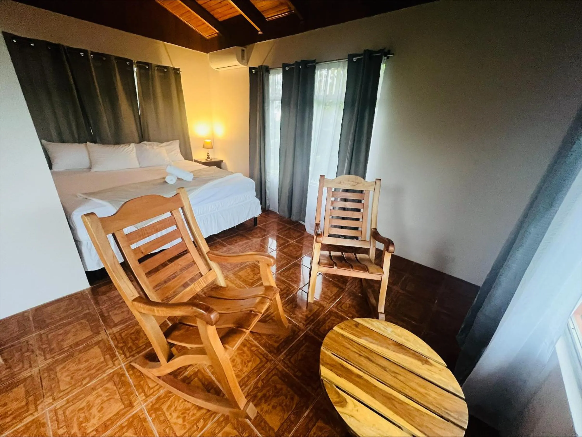 Seating area, Bed in Chateau Arenal Hotel & Restaurante