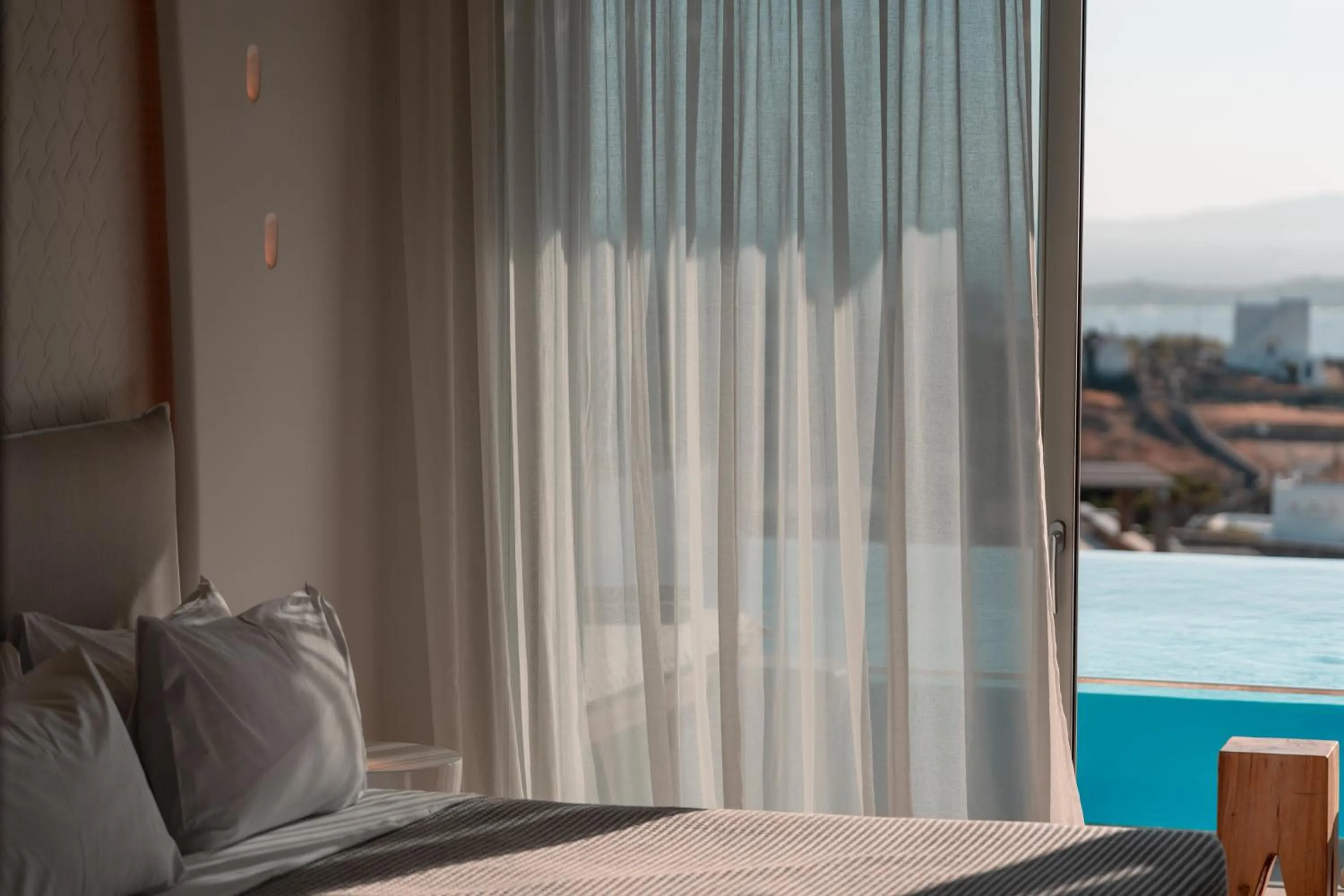 Bed in Nomia Sunset Suites Mykonos