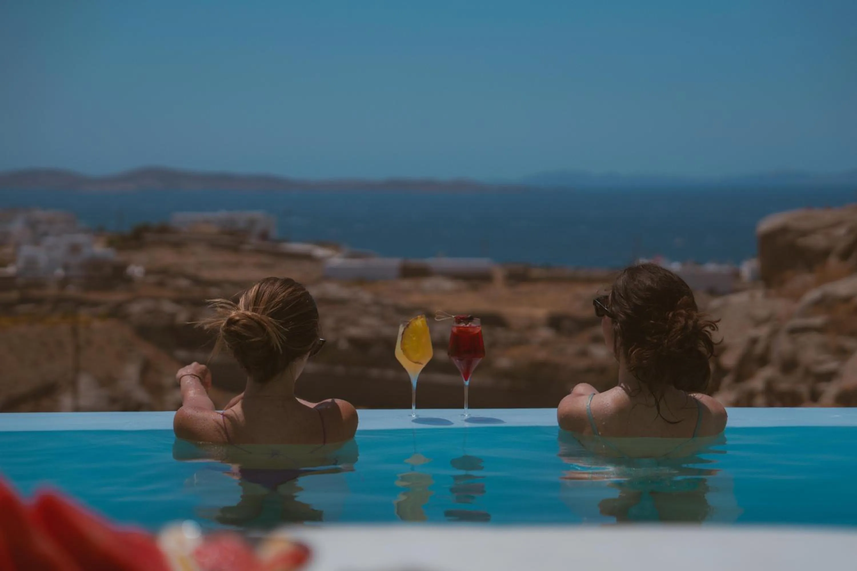 People in Nomia Sunset Suites Mykonos