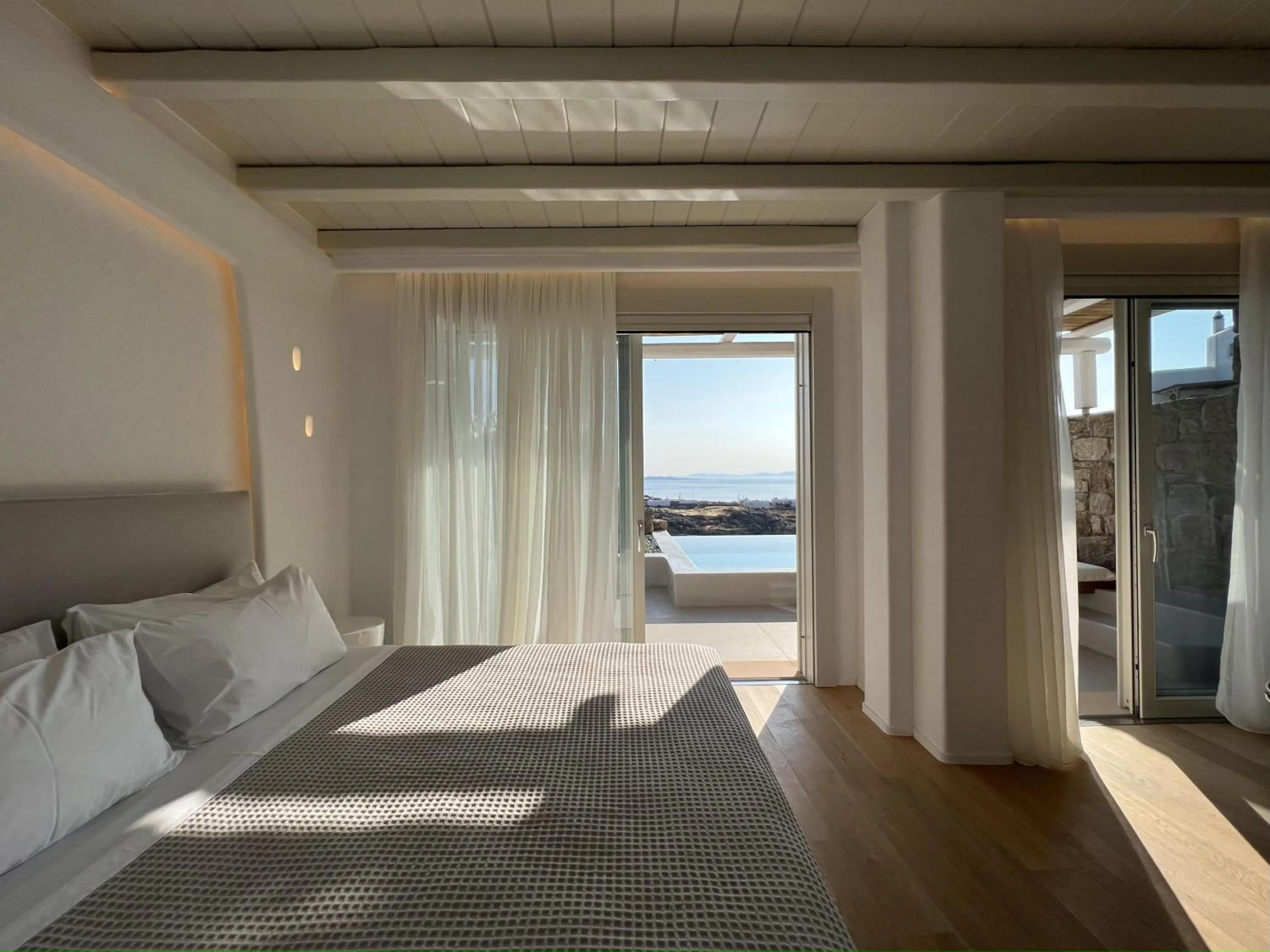 Photo of the whole room, Bed in Nomia Sunset Suites Mykonos