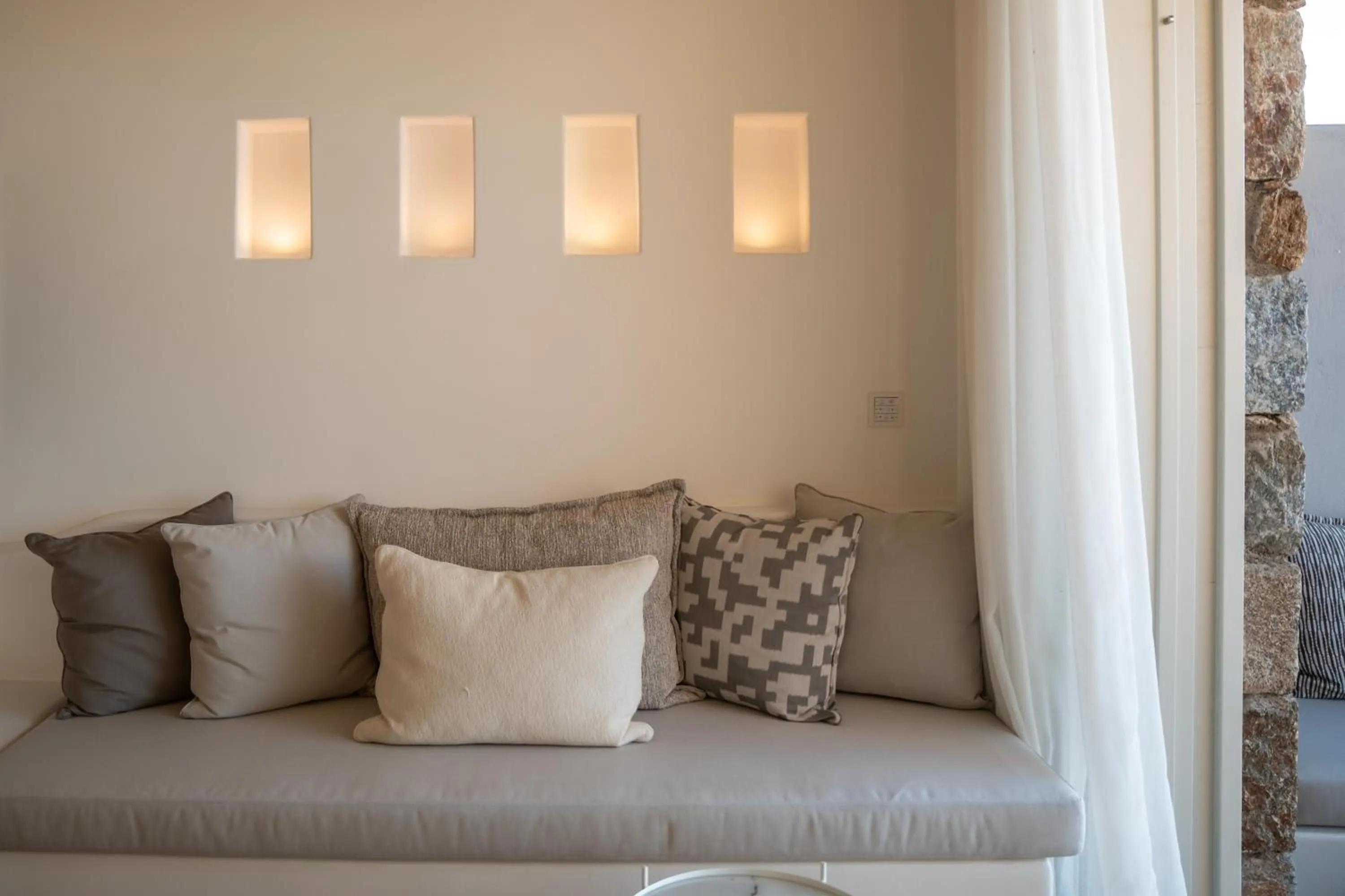 Seating area, Bed in Nomia Sunset Suites Mykonos