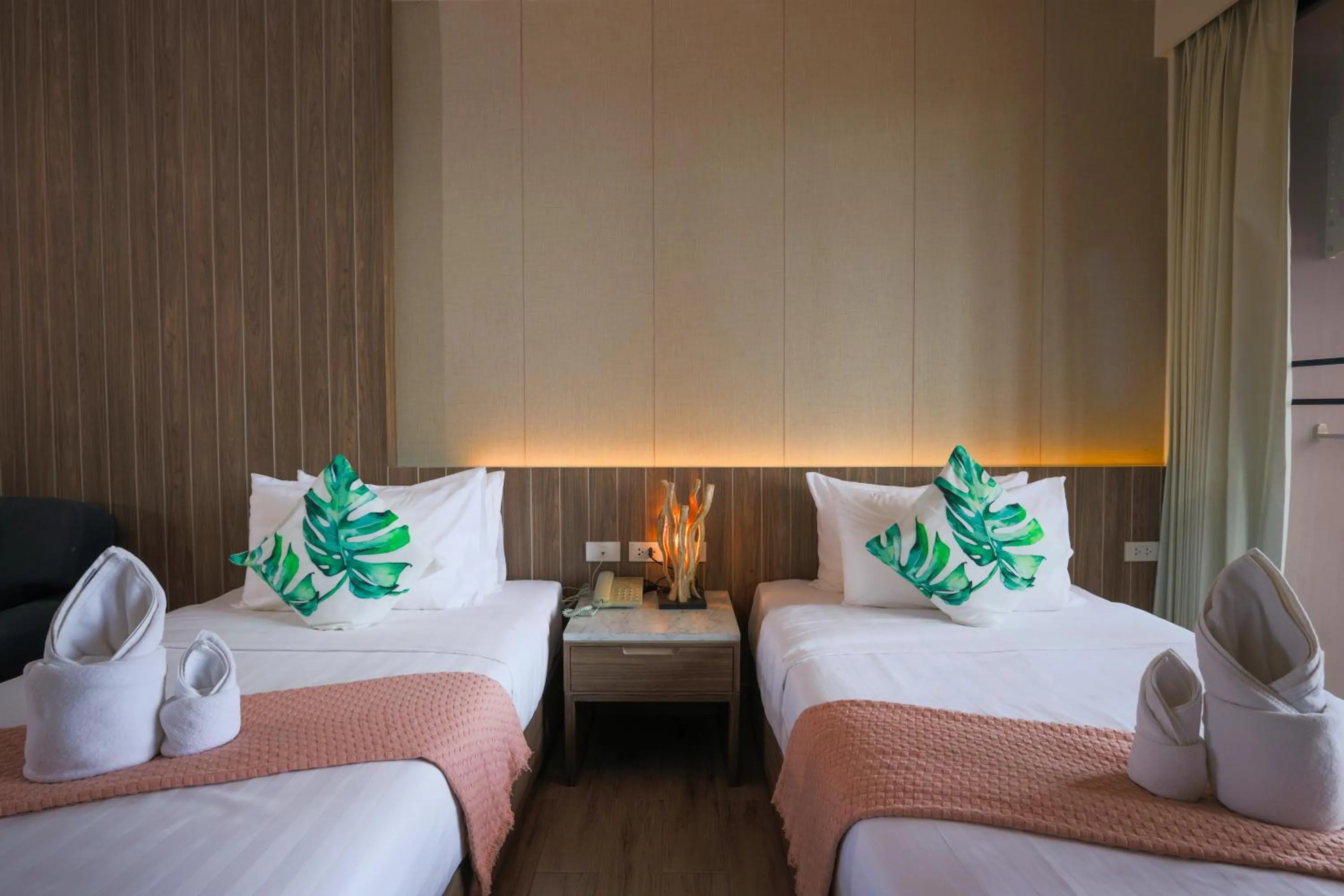 Bed in Alaita Boutique Phuket