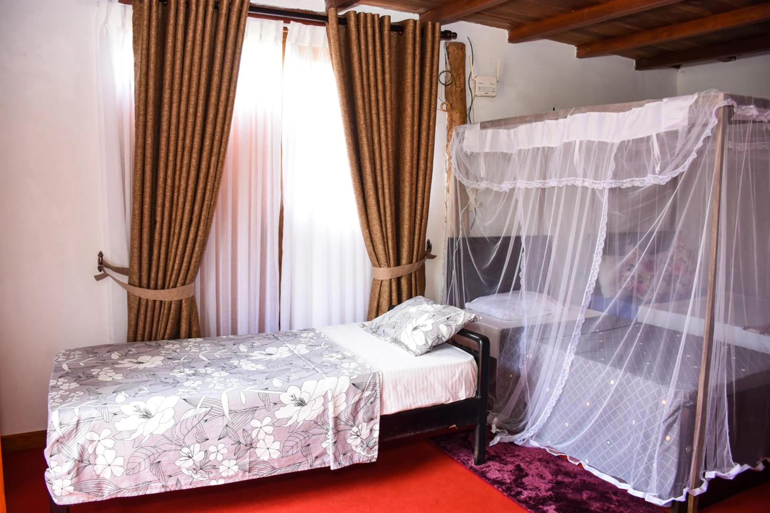 Bed in Steps Garden Resort