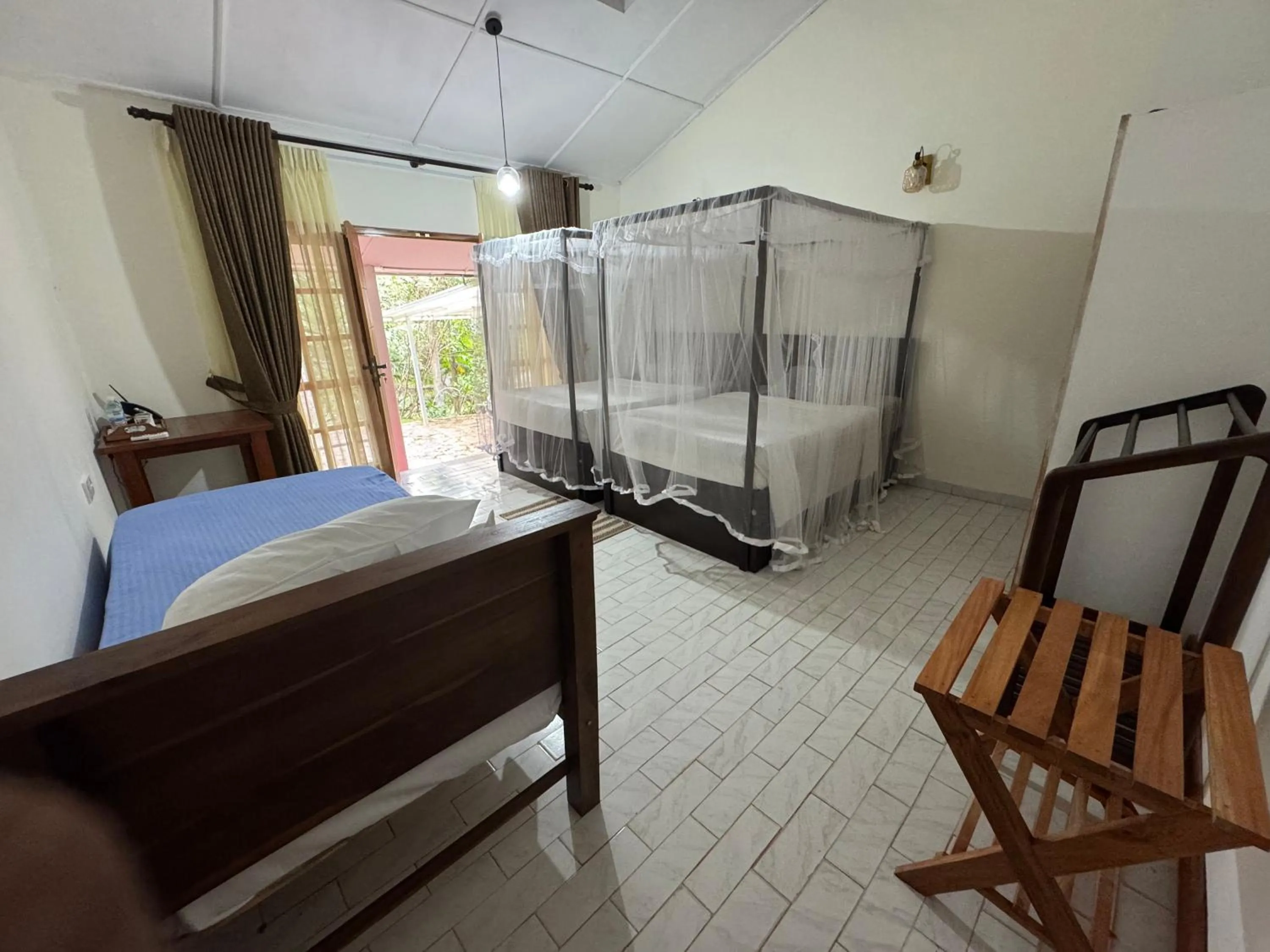 Bed in Steps Garden Resort