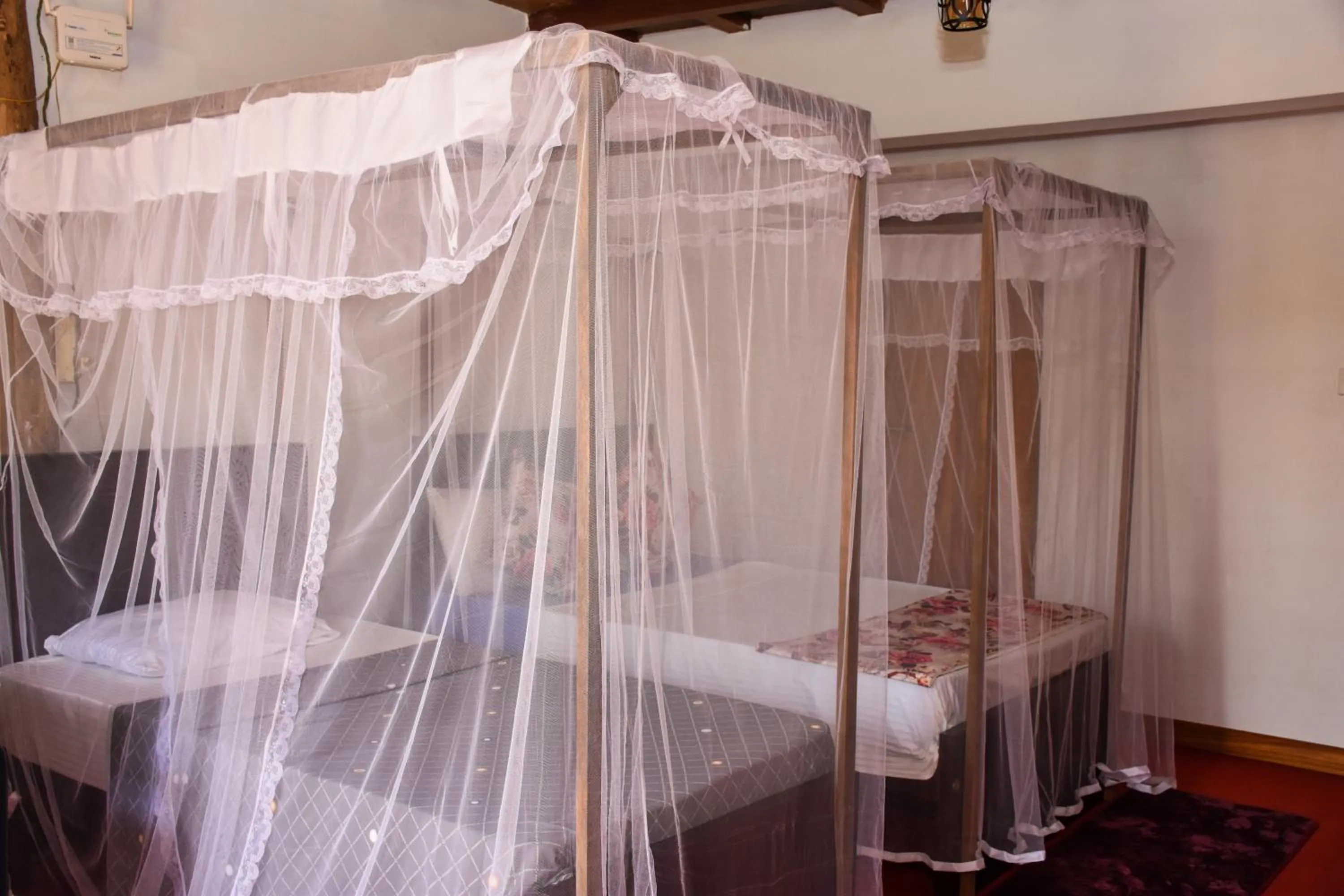 Bed in Steps Garden Resort