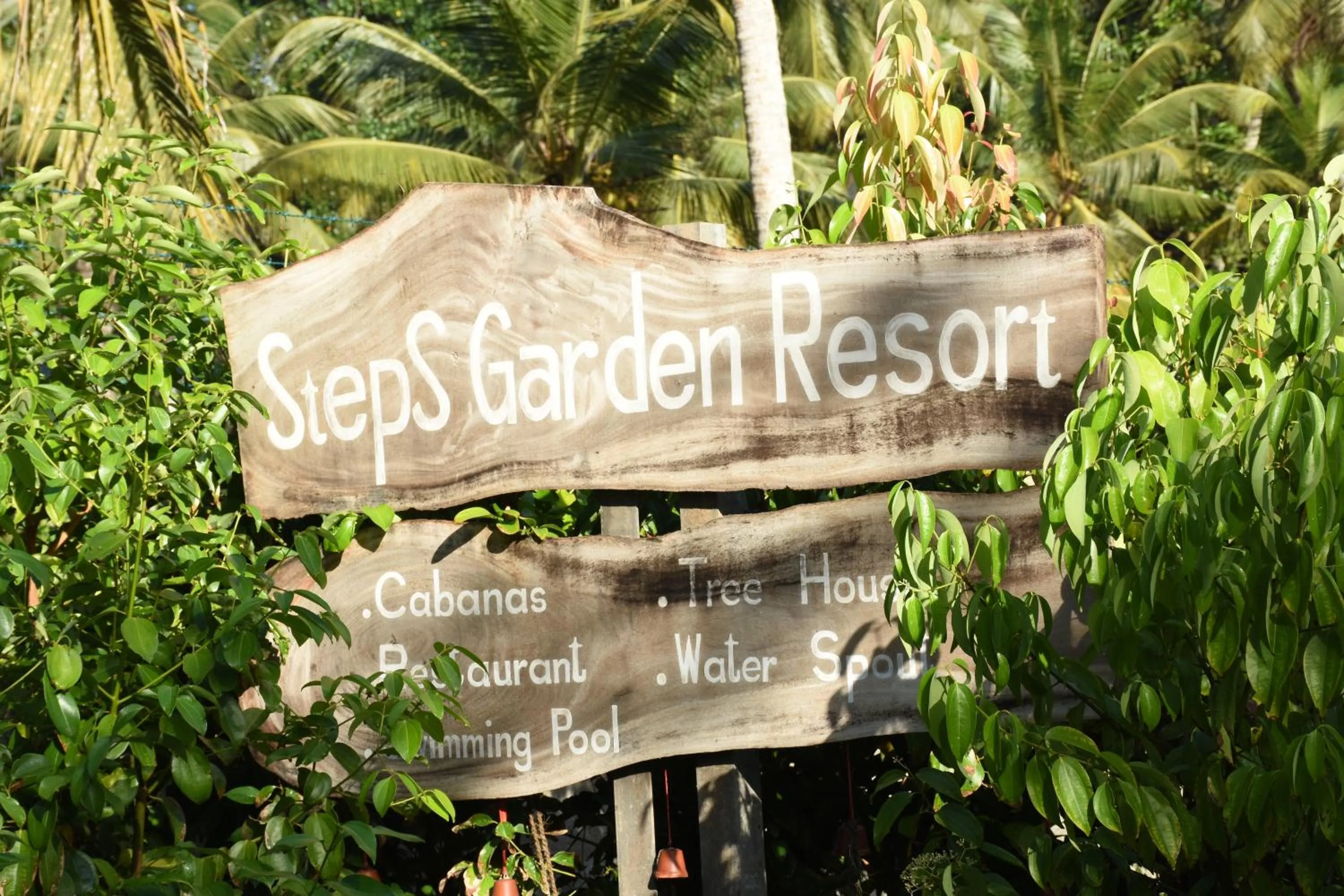 Property logo or sign in Steps Garden Resort