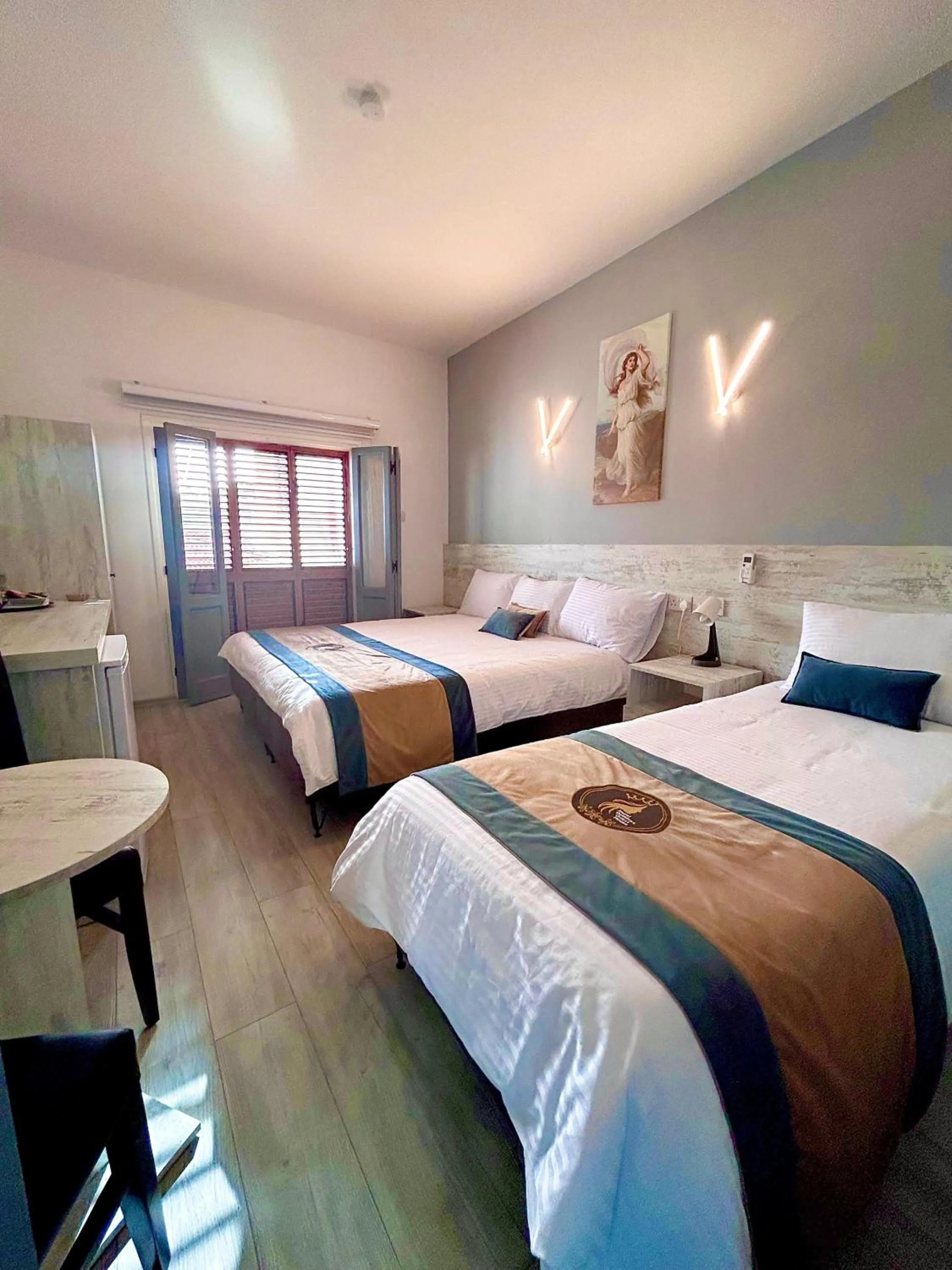 Bed in Royal Goddess Guest House, Walled City