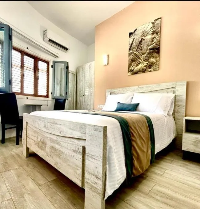 Bed in Royal Goddess Guest House, Walled City