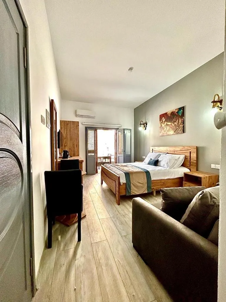 Bed in Royal Goddess Guest House, Walled City