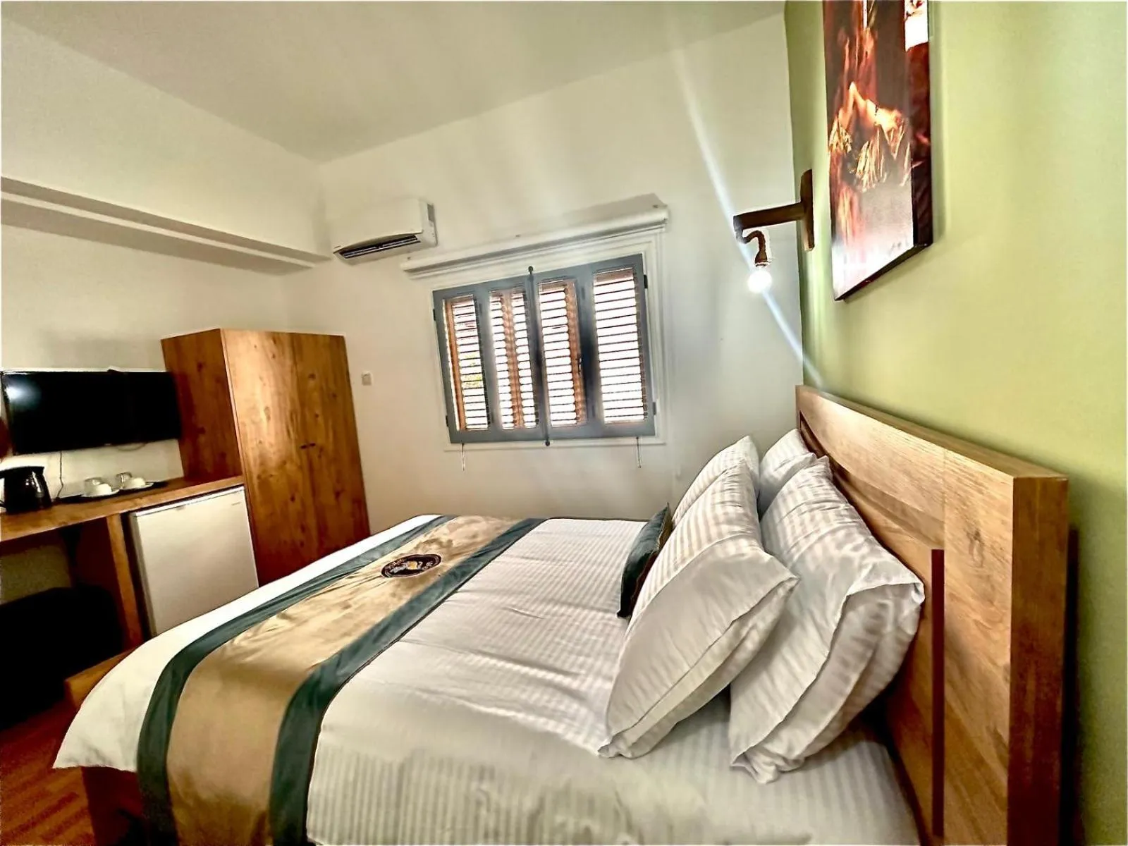 Bed in Royal Goddess Guest House, Walled City