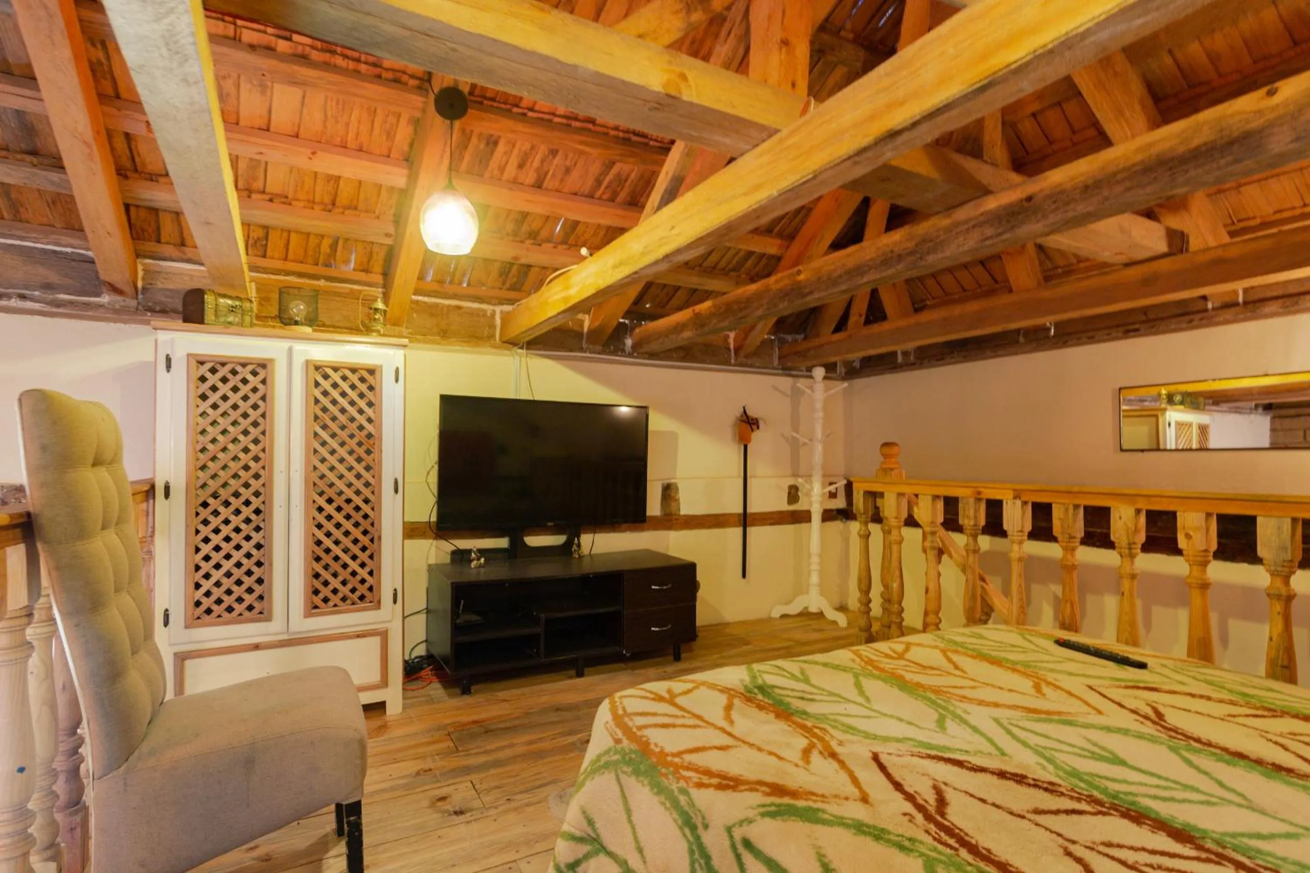 Communal lounge/ TV room, Bed in Hotel Boutique El Rincón