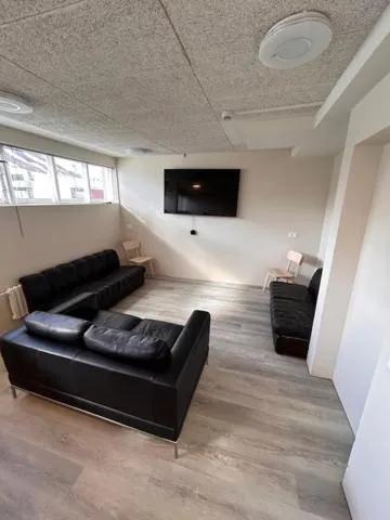 Communal lounge/ TV room in Hótel Dalvík