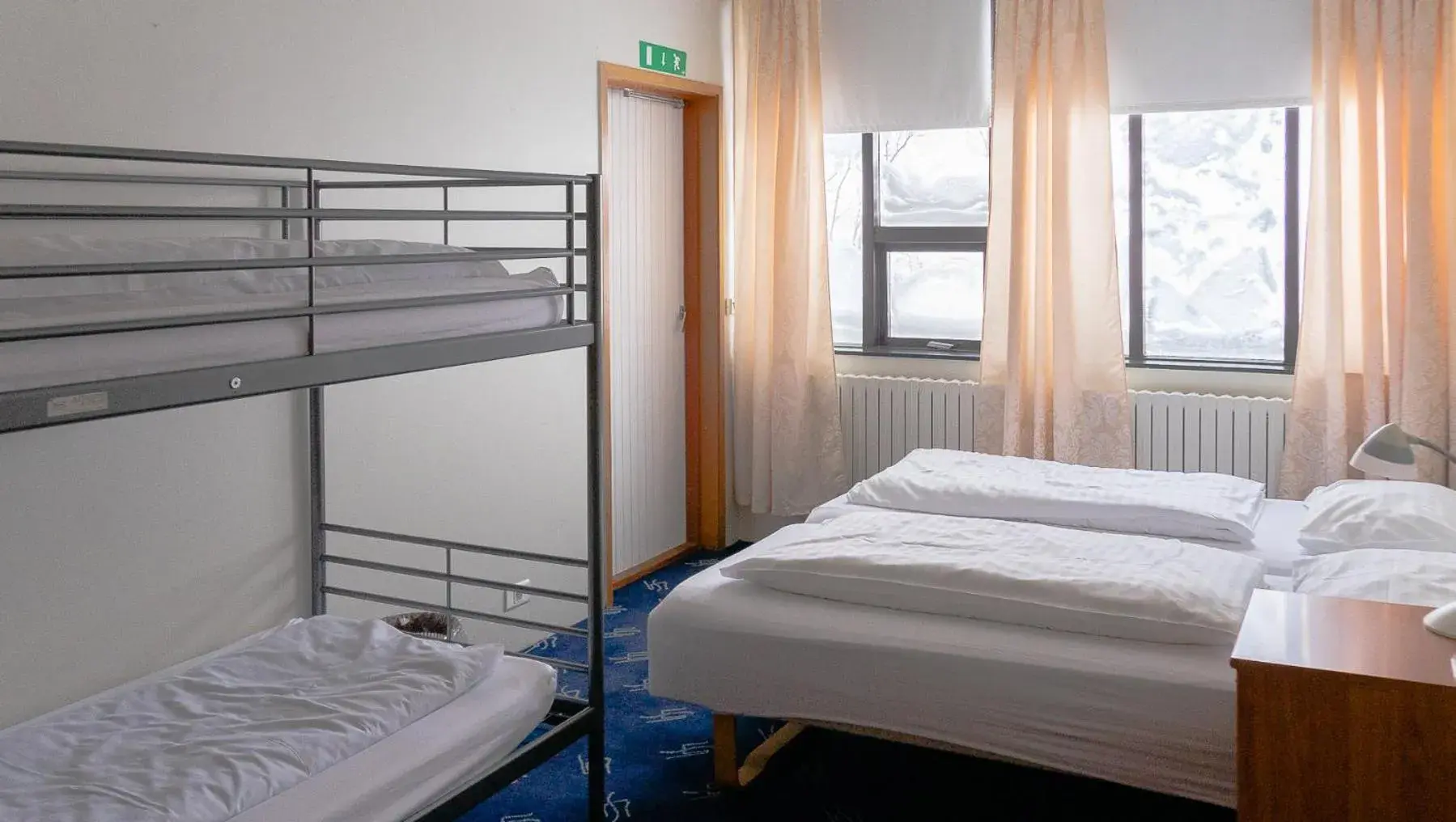 Quadruple Room with Garden View in Hótel Dalvík Quadruple Room with Garden View in Hótel Dalvík