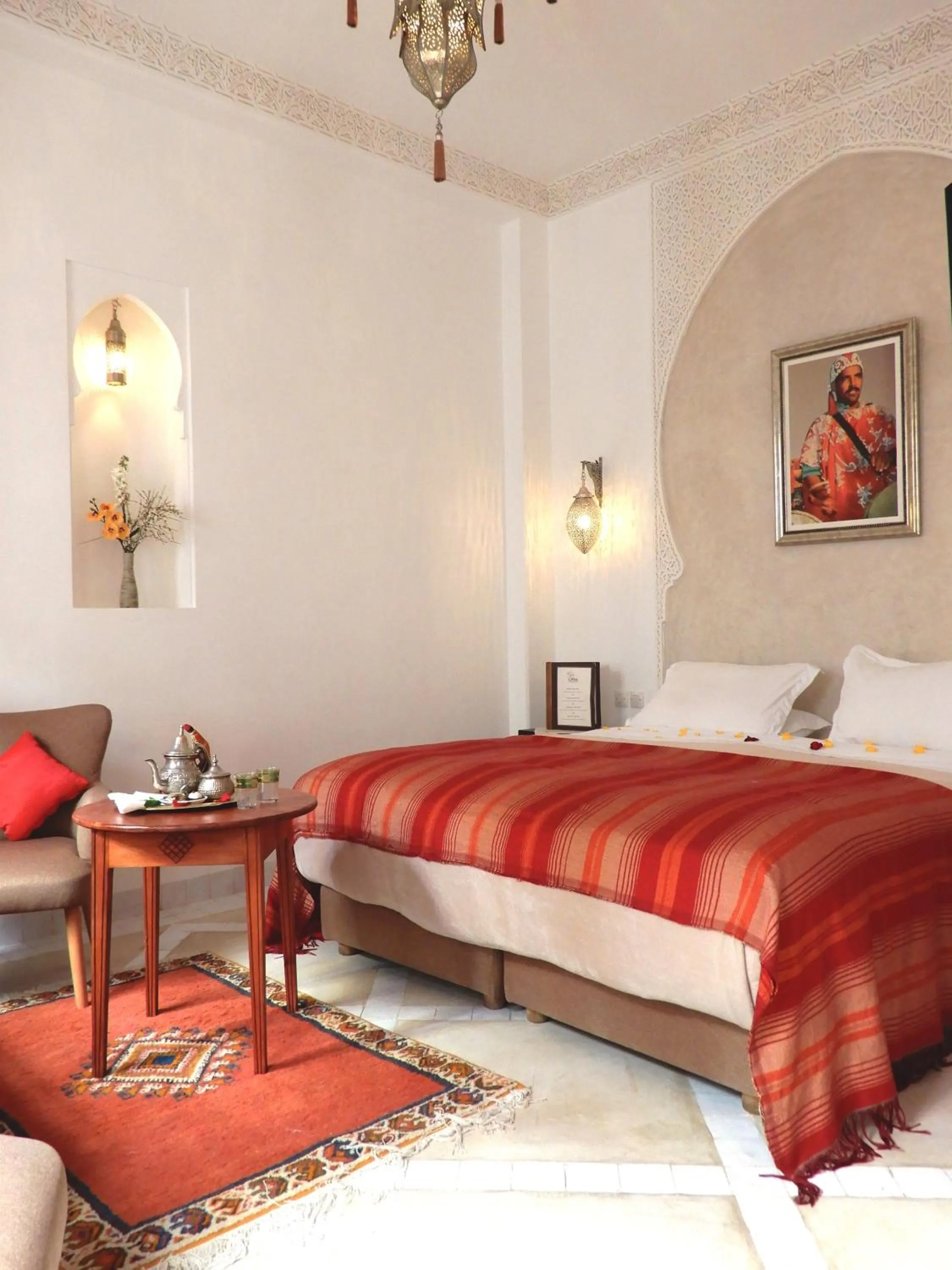 Seating area, Bed in Riad Carina