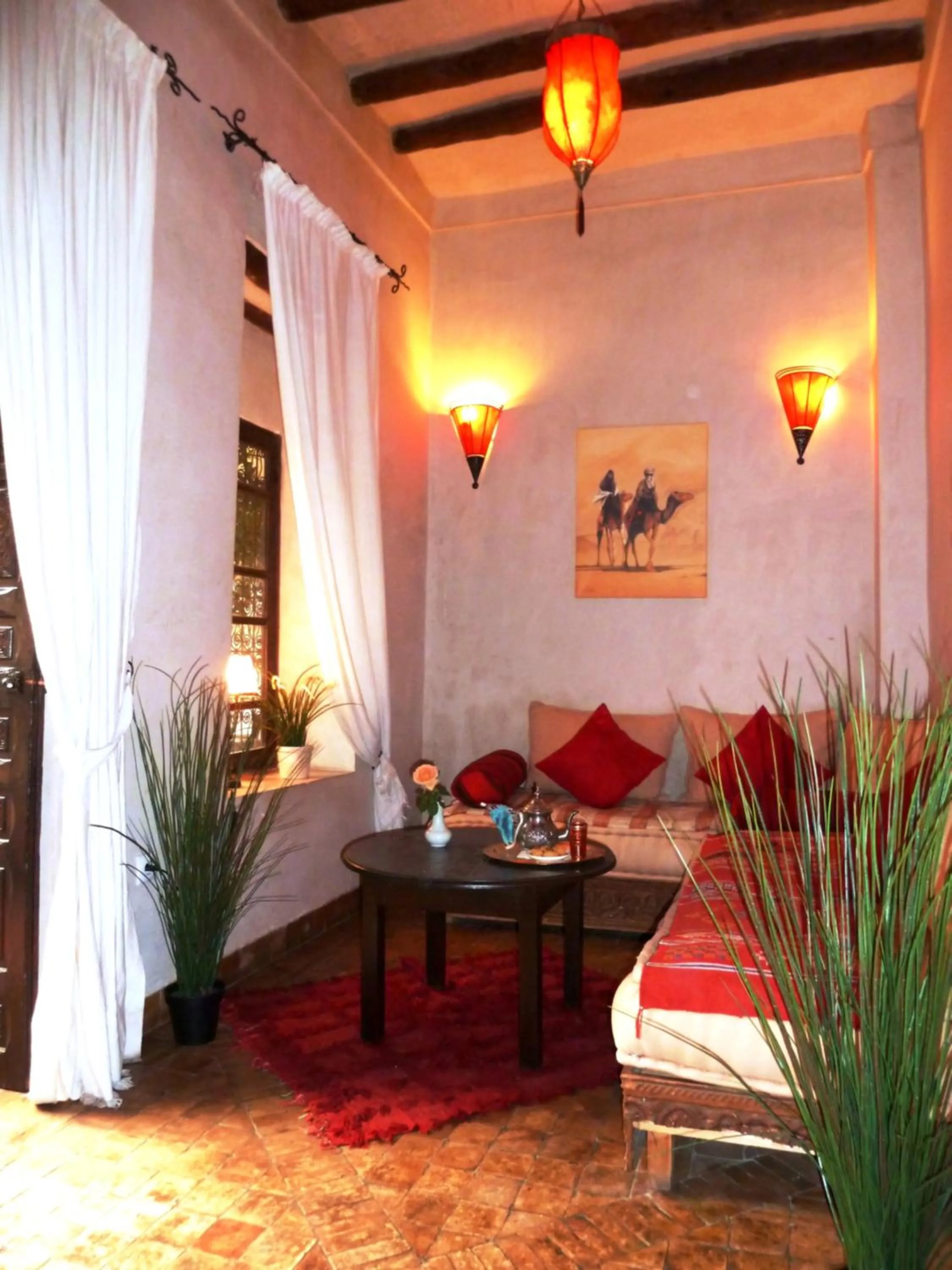 Seating area, Bed in Riad Carina