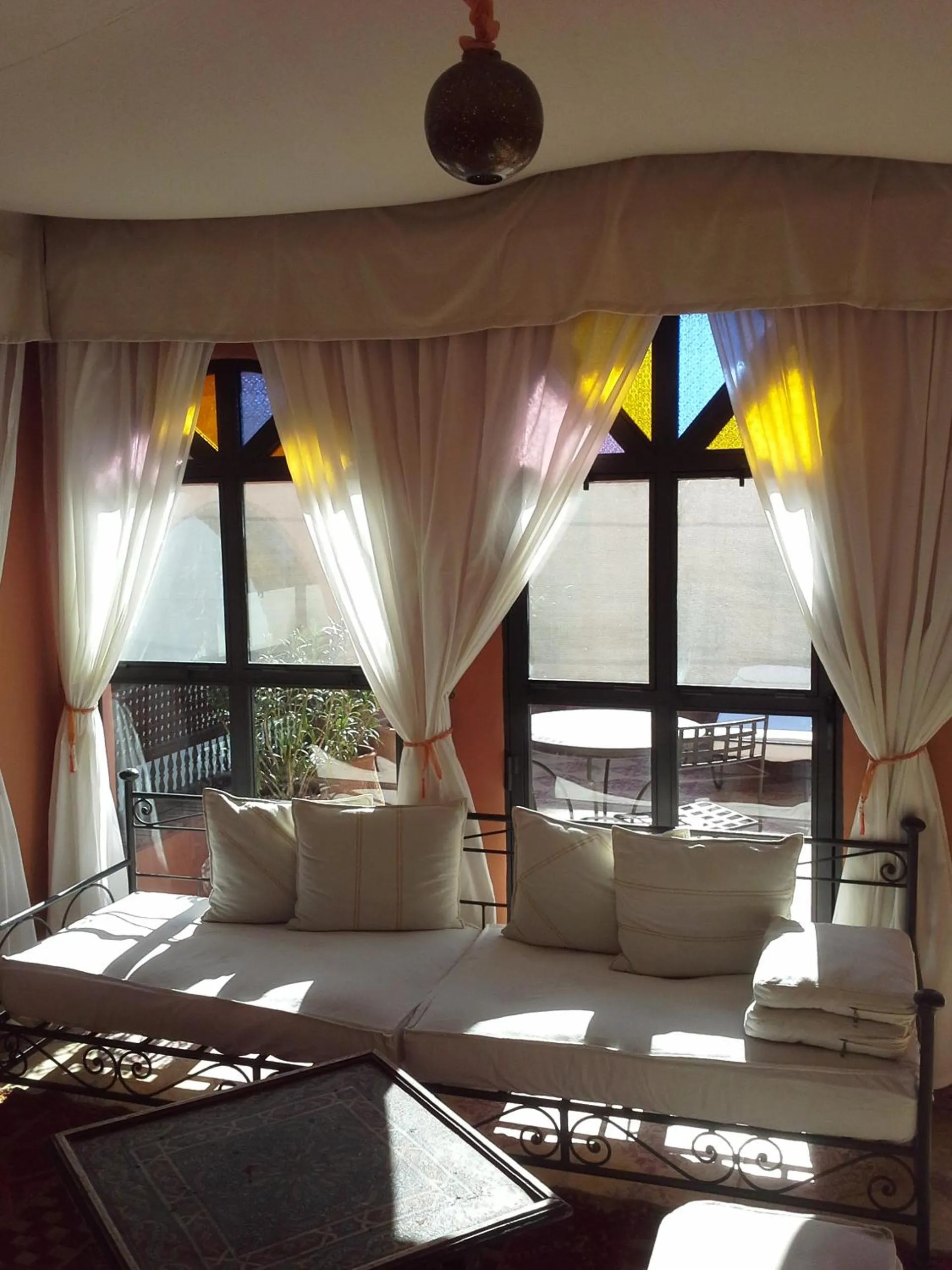 Living room, Bed in Riad Maison Arabo-Andalouse