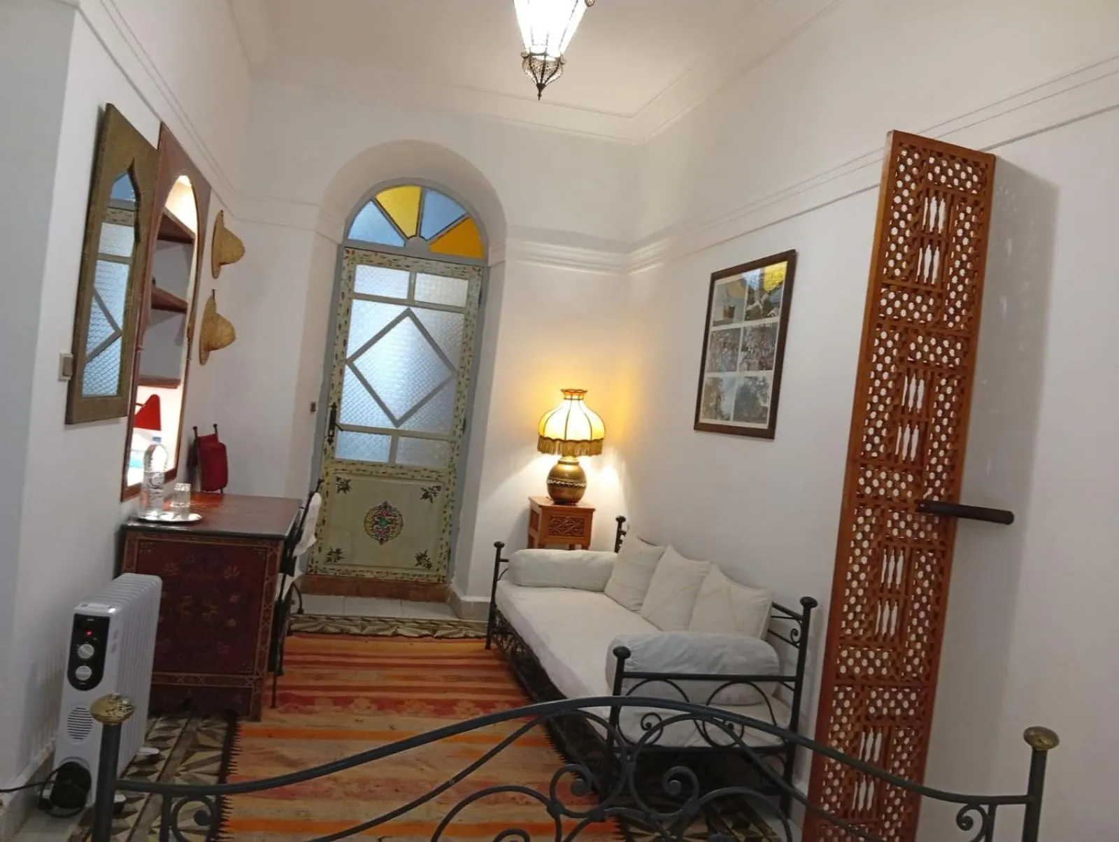Living room, Bed in Riad Maison Arabo-Andalouse
