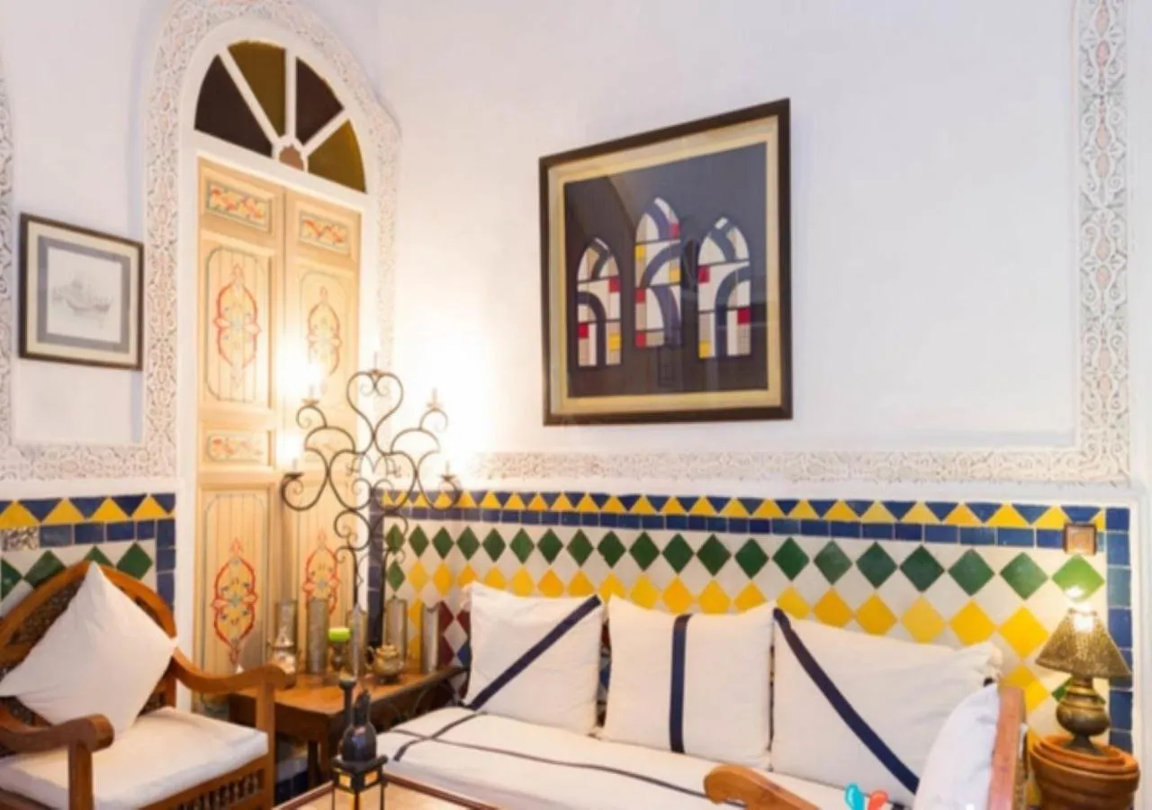 Living room, Bed in Riad Maison Arabo-Andalouse