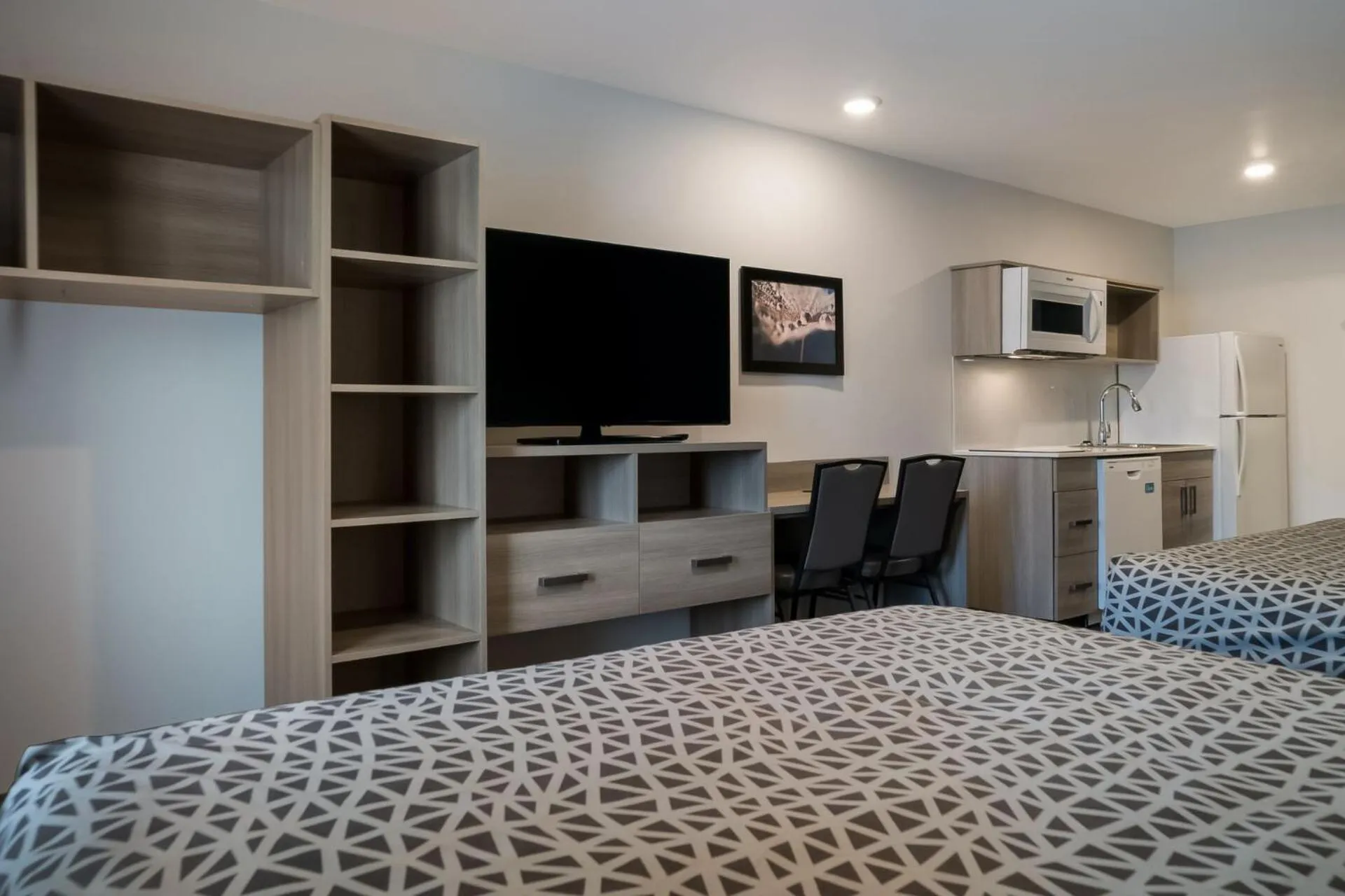 Kitchen or kitchenette, Bed in WoodSpring Suites Detroit Sterling Heights