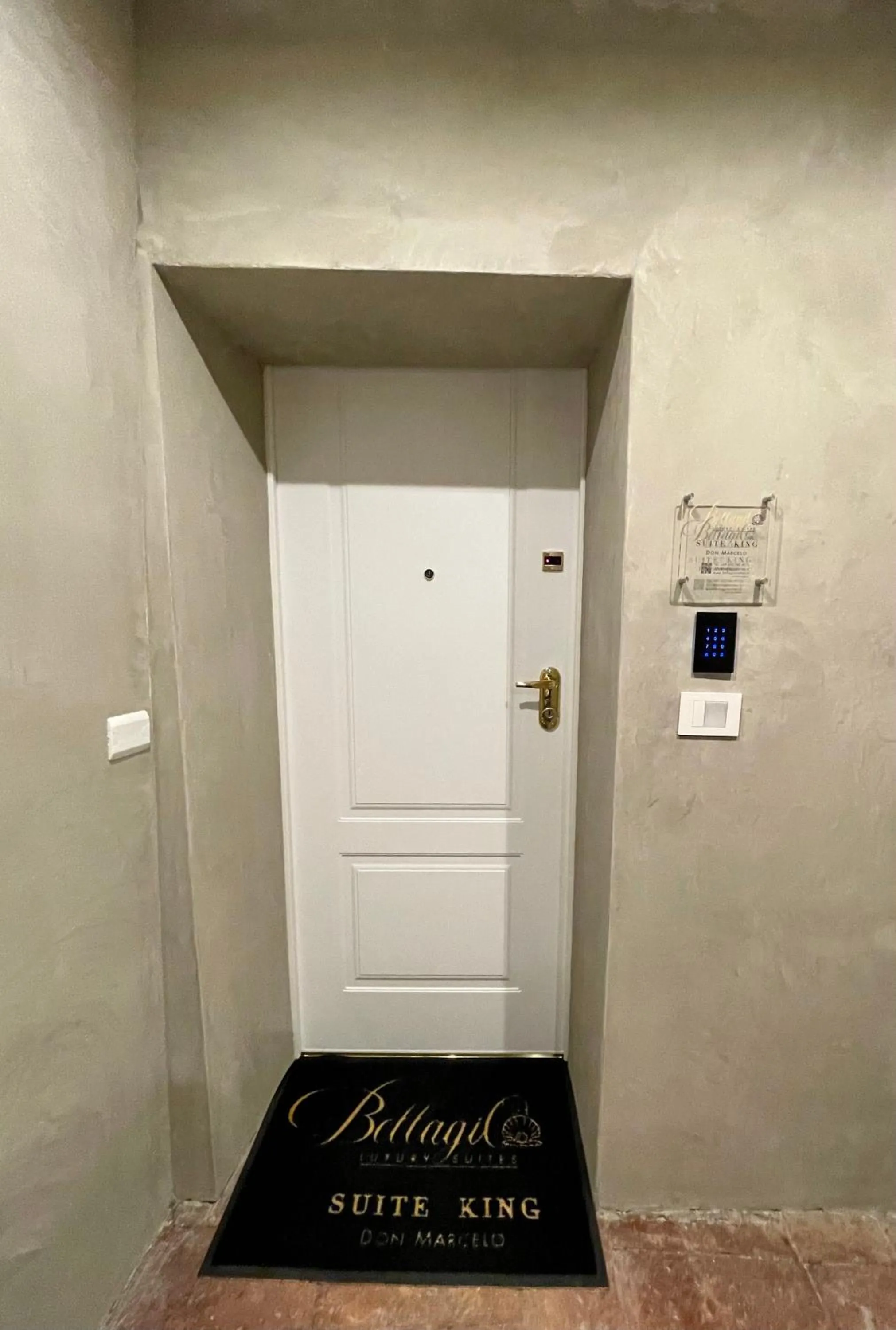 Property logo or sign in Bellagio Luxury Suites Apartments