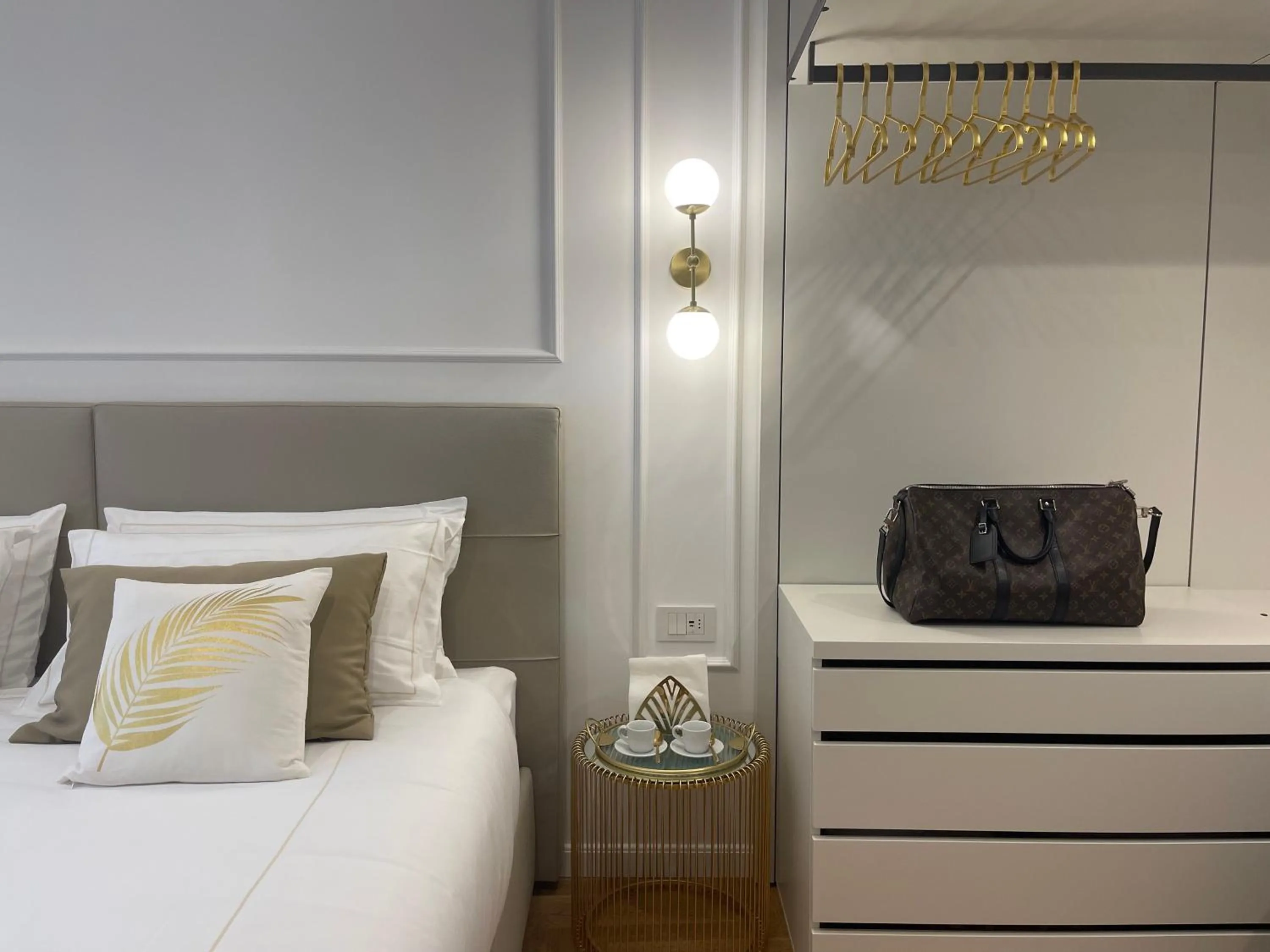 Bed in Bellagio Luxury Suites Apartments