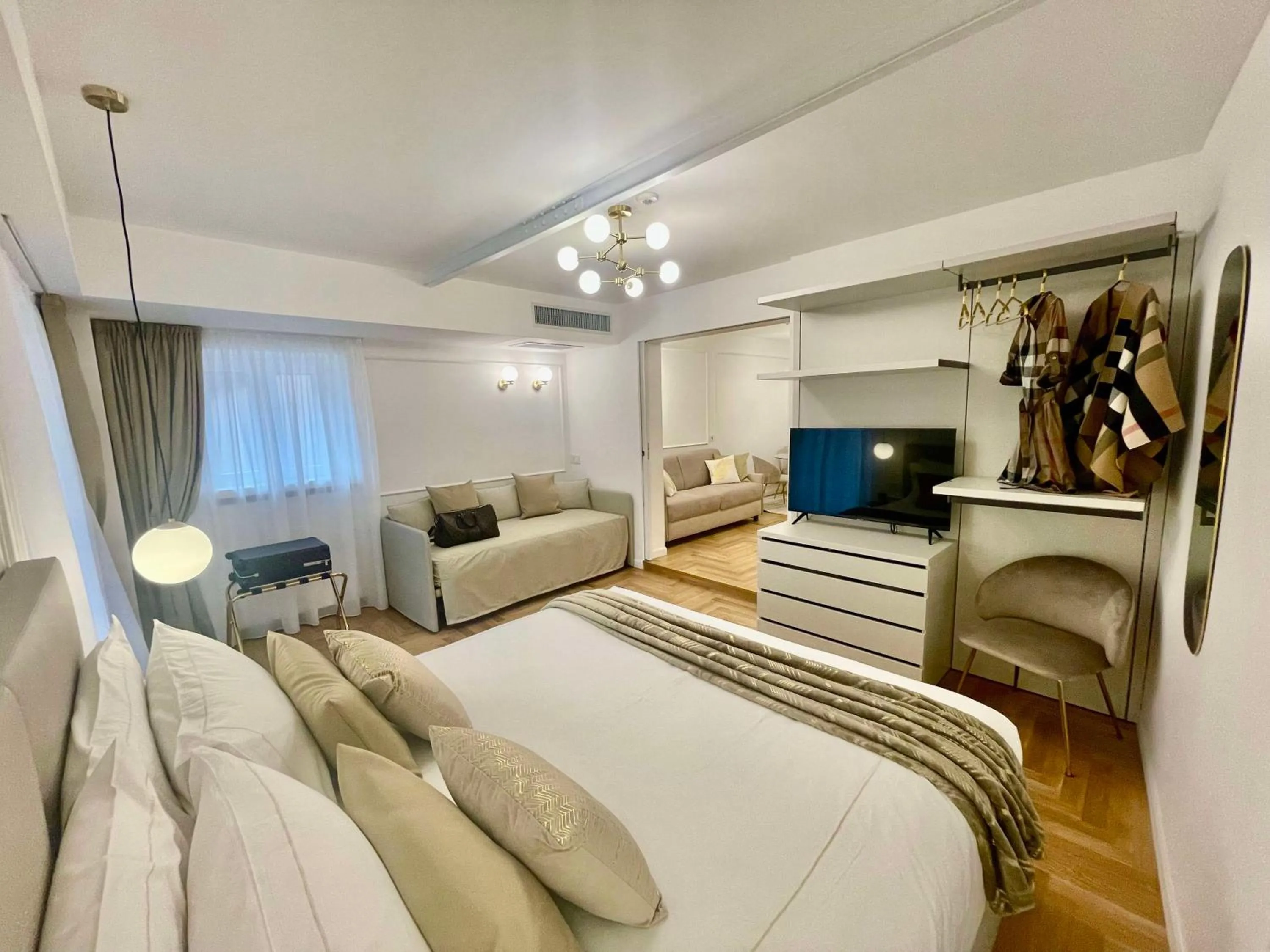 Bed in Bellagio Luxury Suites Apartments