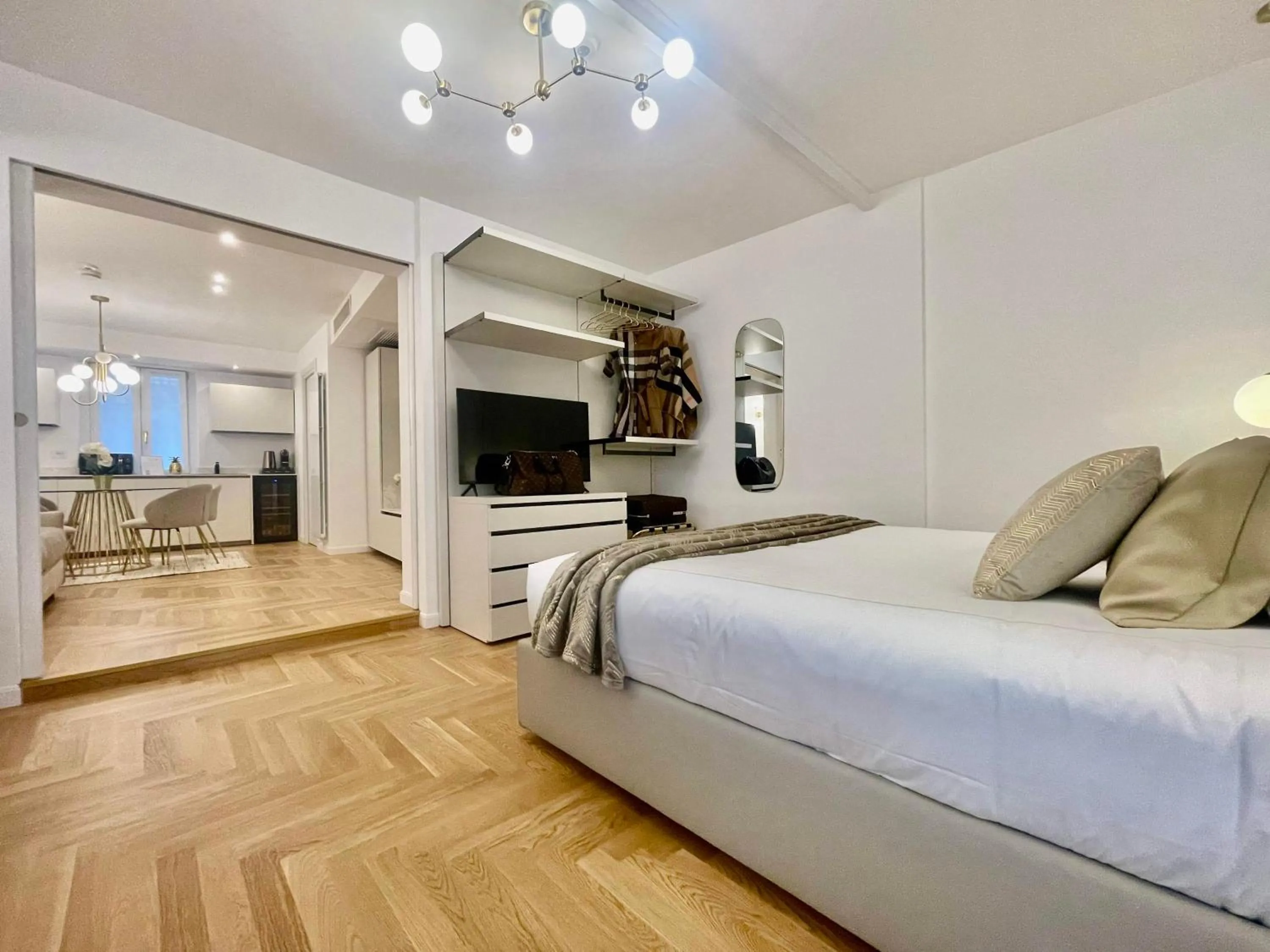 Bed in Bellagio Luxury Suites Apartments